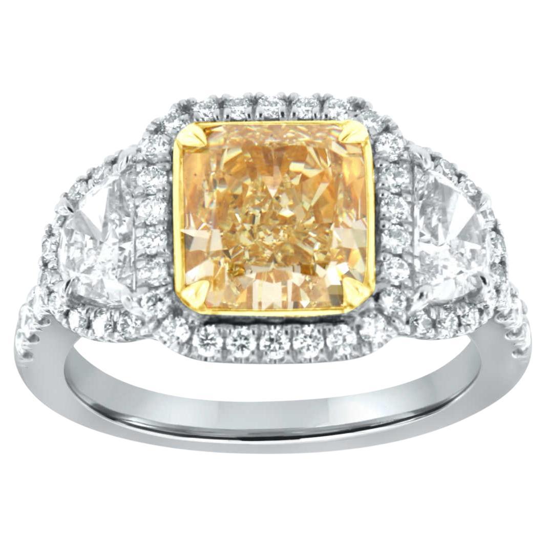 3.04 Carat GIA Certified Square Cushion VVS2 Yellow Diamond Halo Ring For Sale