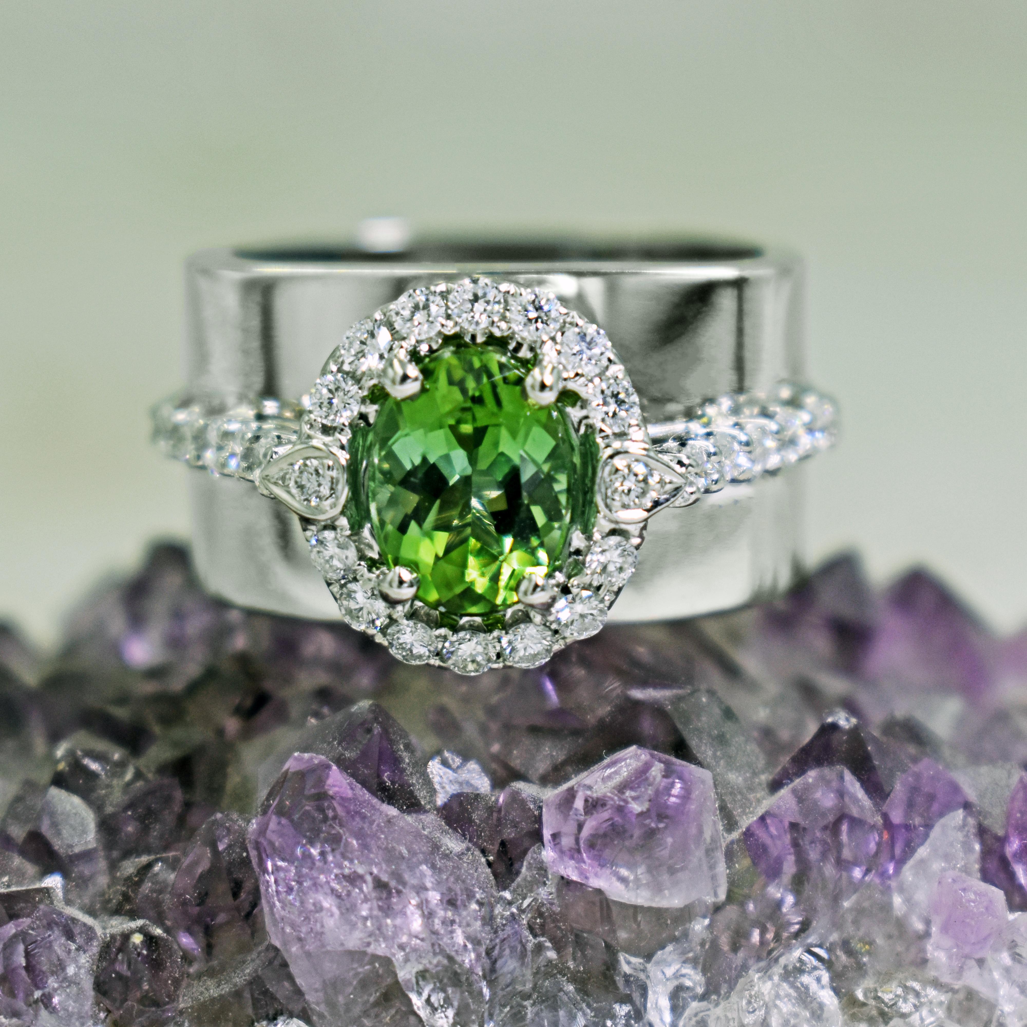 3.04 carat Mint Green Tourmaline and diamond halo (0.37 ctw, G-H, SI1-SI2) 14k white gold engagement or cocktail ring. Size 7. Mint Tourmaline and diamond halo is set on a wide, square and tapered ring band giving an elegant, timeless setting a