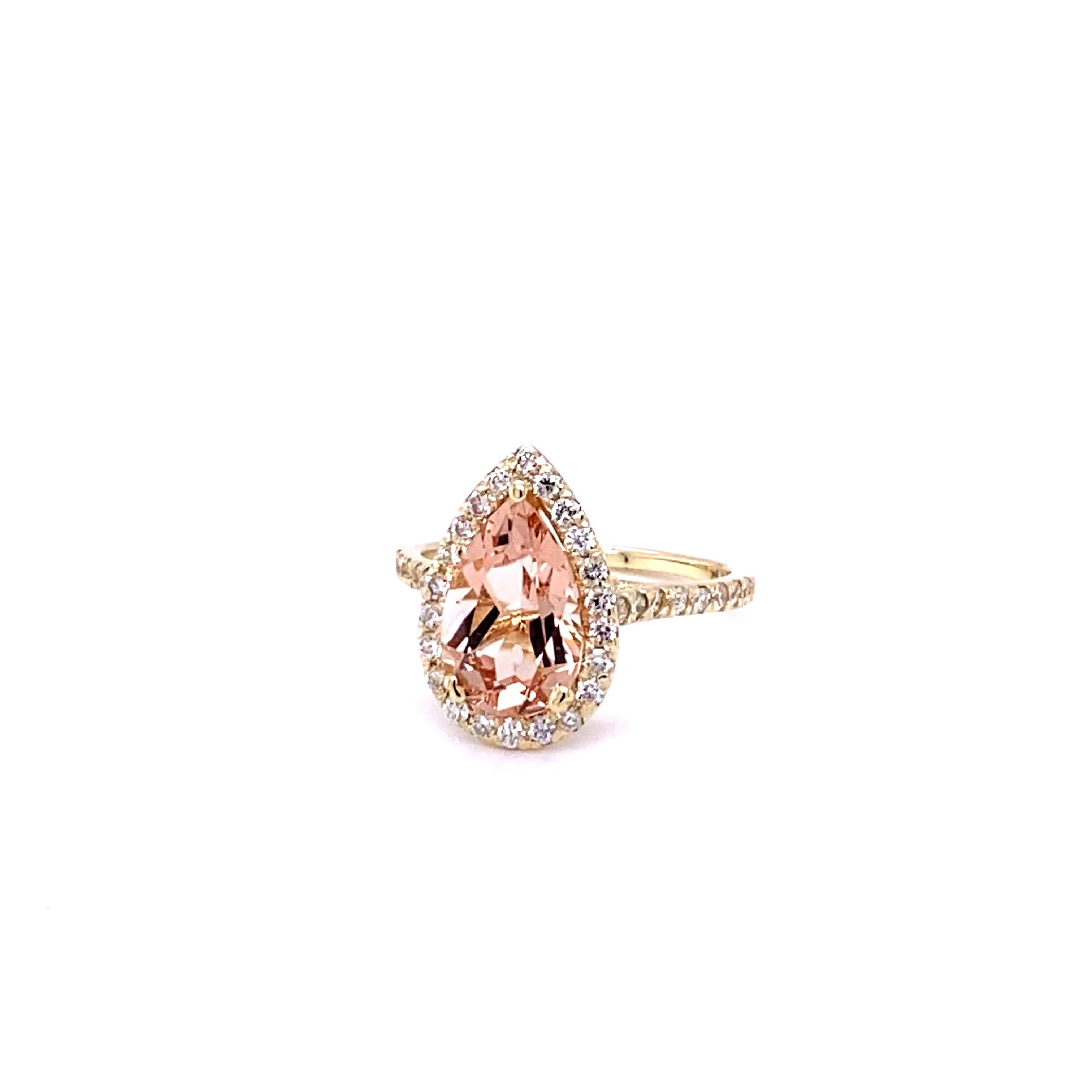 3.04 Carat Morganite Diamond 14K Yellow Gold Engagement Ring

This stunning ring has a Pear Cut Morganite as its center that weighs 2.47 Carats.  The Morganite is surrounded by a Halo of 39 Round Cut Diamonds that weigh 0.57 Carats.  (Clarity: SI2,