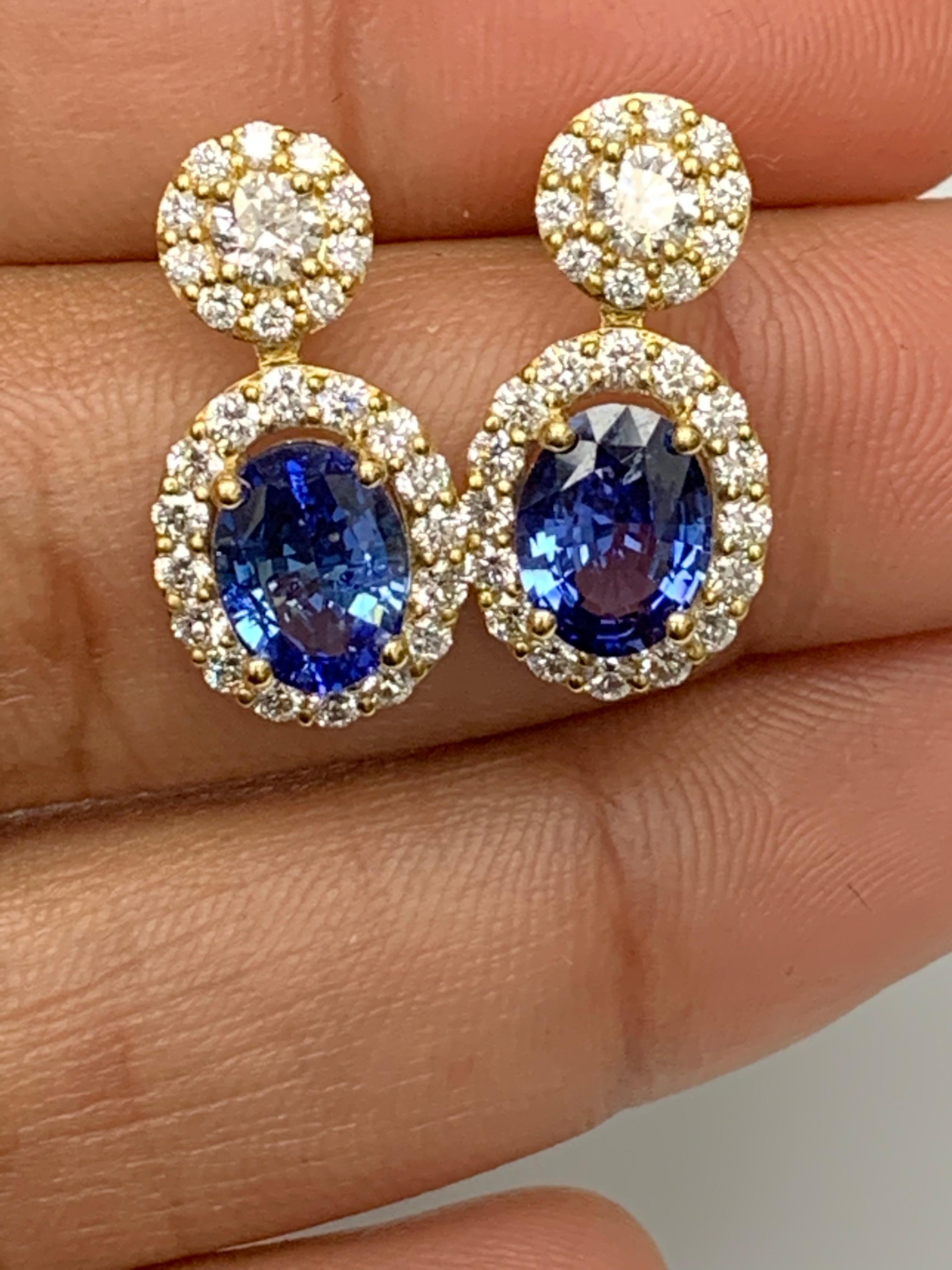 3.04 Carat of Oval Shape Blue Sapphire Diamond Drop Earrings in 18K Yellow Gold For Sale 5