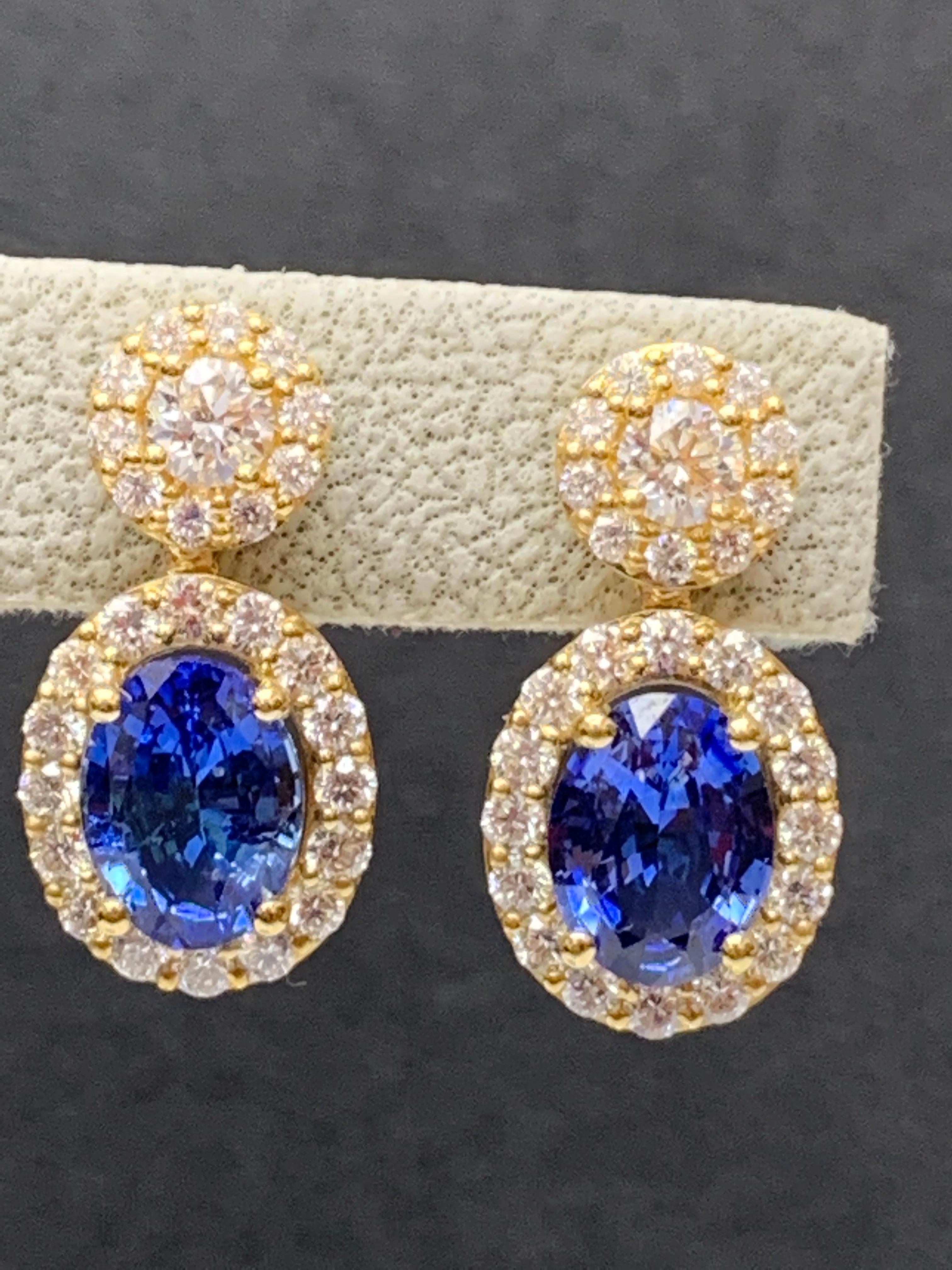 3.04 Carat of Oval Shape Blue Sapphire Diamond Drop Earrings in 18K Yellow Gold For Sale 9