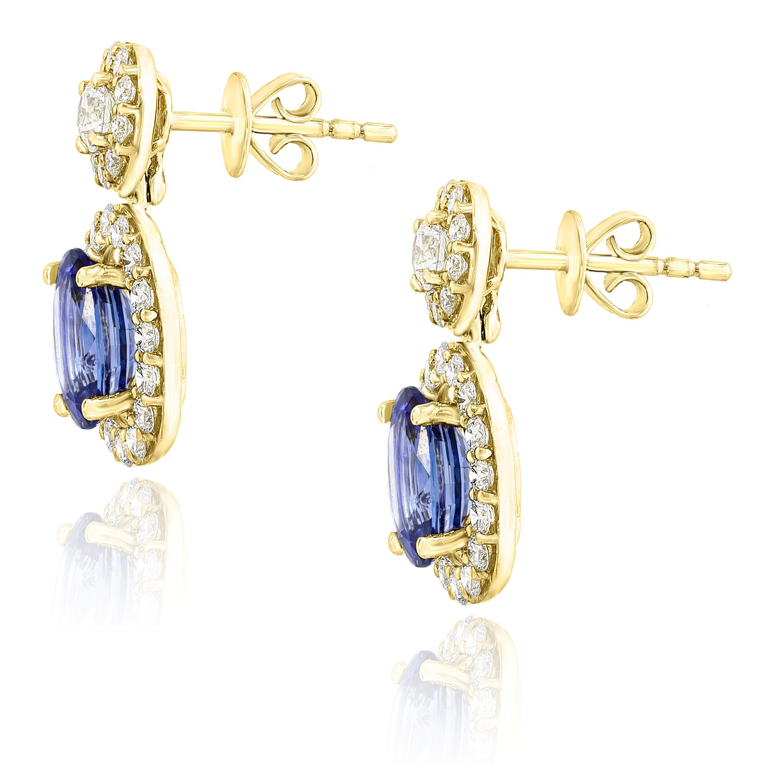 Contemporary 3.04 Carat of Oval Shape Blue Sapphire Diamond Drop Earrings in 18K Yellow Gold For Sale