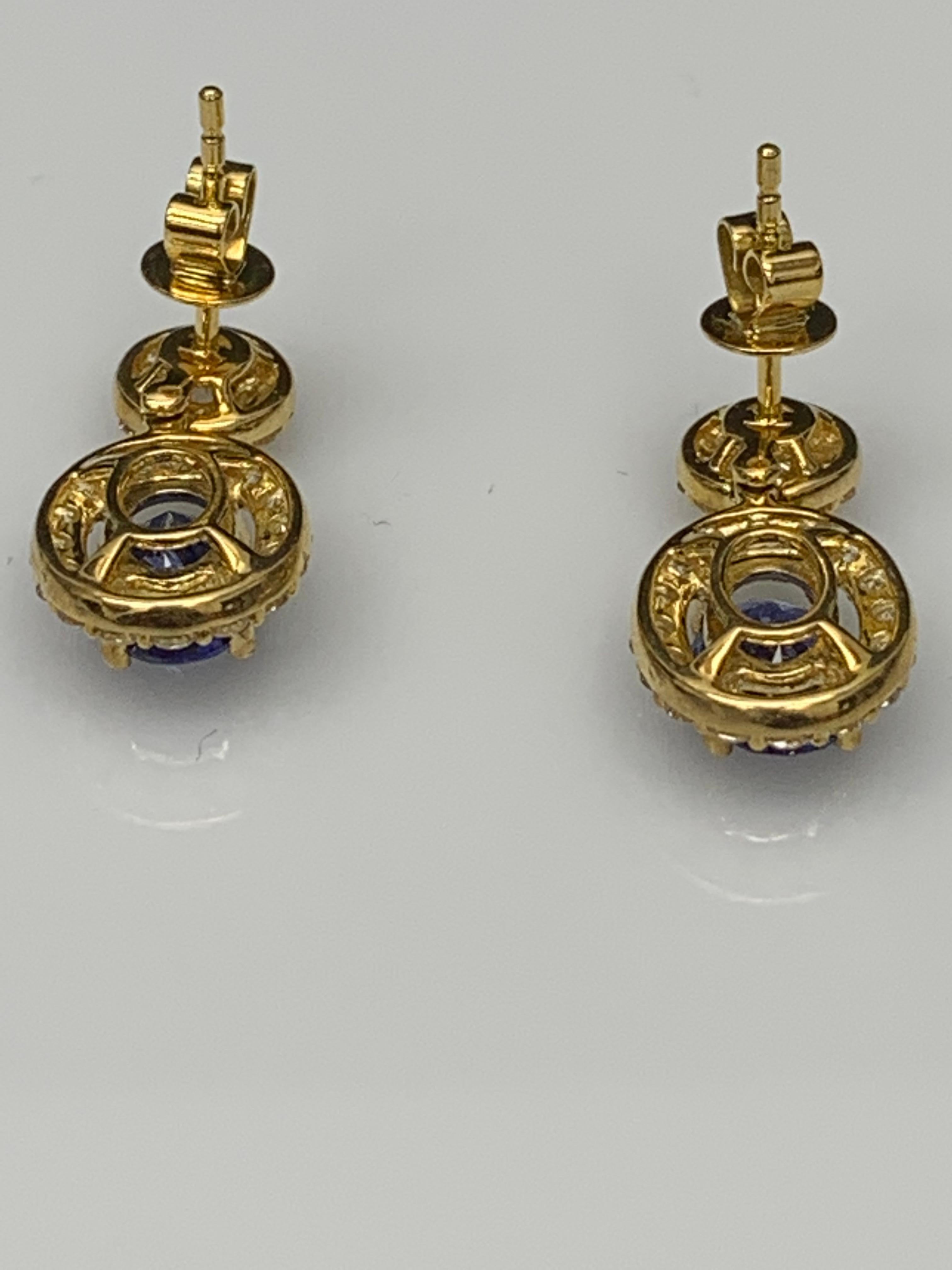 Oval Cut 3.04 Carat of Oval Shape Blue Sapphire Diamond Drop Earrings in 18K Yellow Gold For Sale