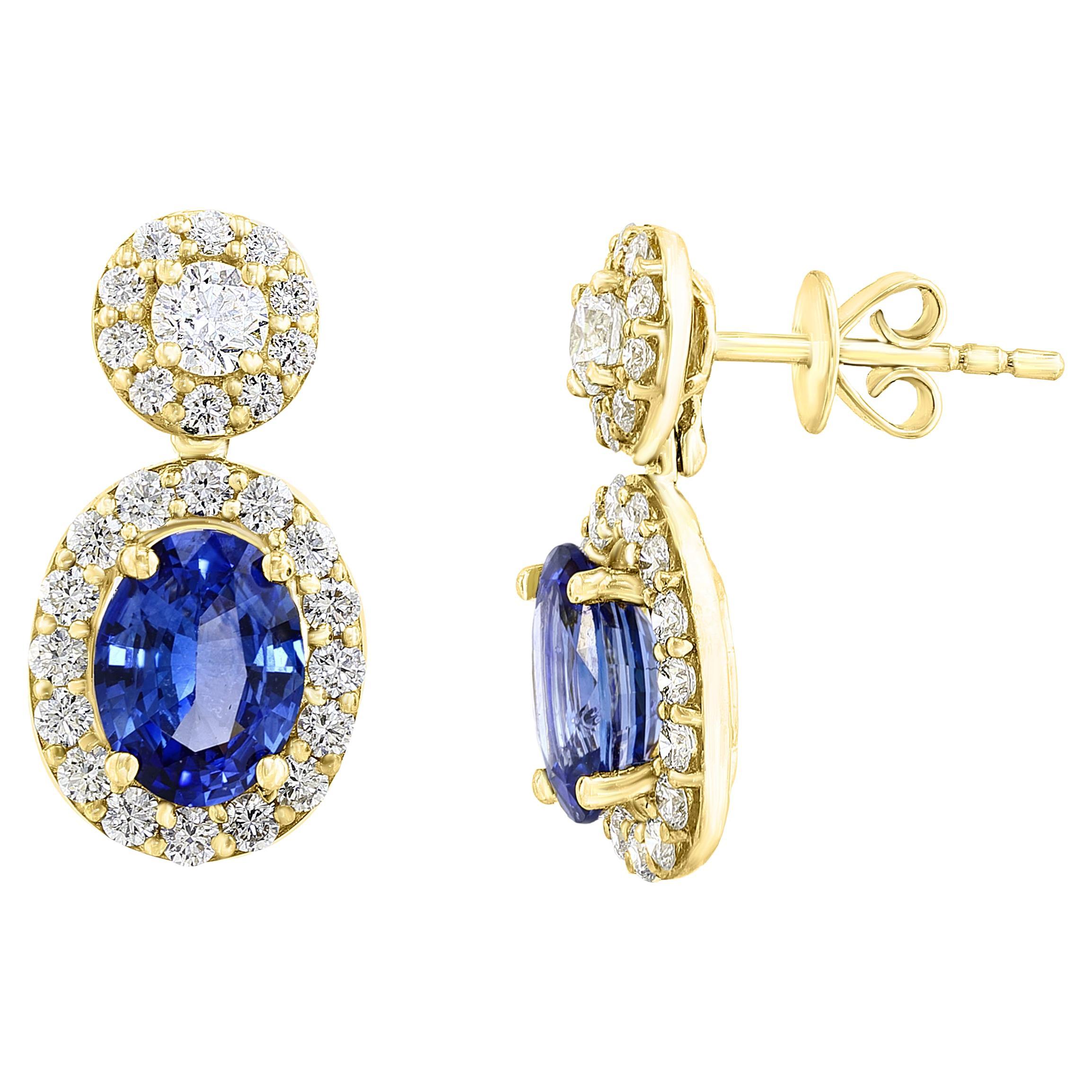 3.04 Carat of Oval Shape Blue Sapphire Diamond Drop Earrings in 18K Yellow Gold For Sale
