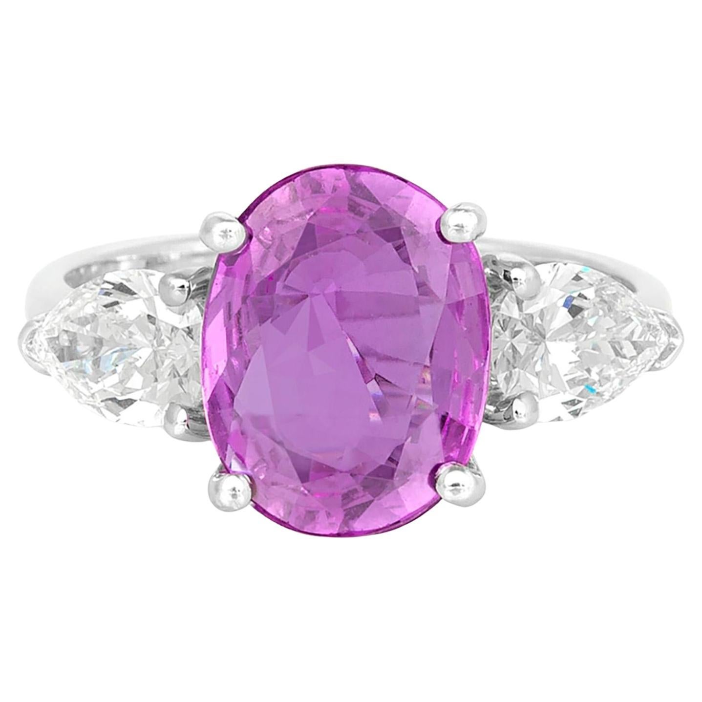 3.04 Carat Oval Cut Pink Sapphire & 1.05 Carat Diamonds Ring For Sale