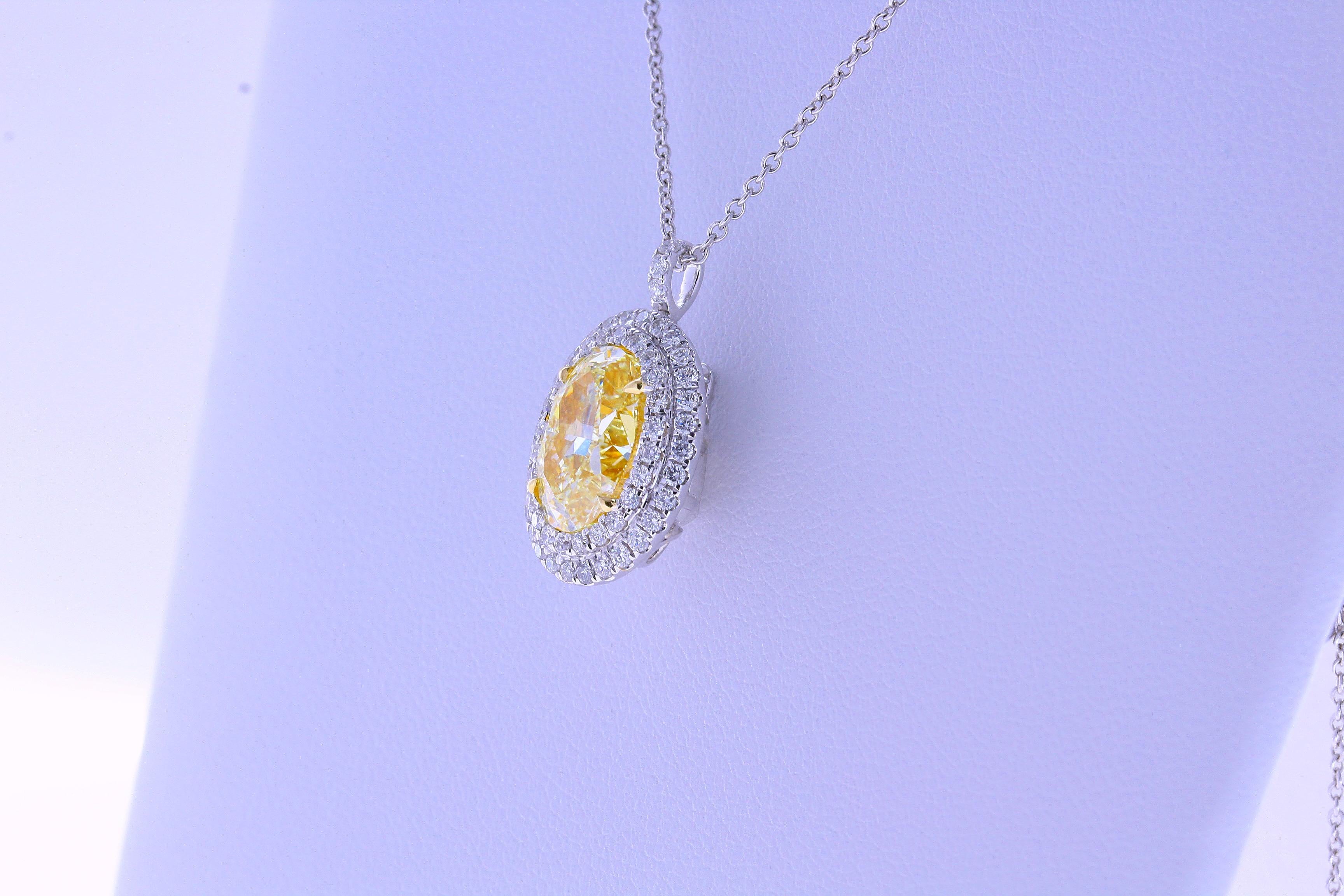 3.04 Carat Oval Shape Fancy Yellow VS1 Diamond Ring Pendant 18 Karat Gold For Sale 2