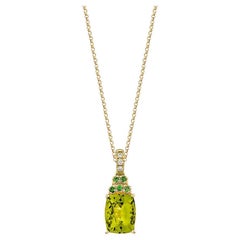 3.04 Carat Peridot Pendant in 18Karat Yellow Gold with Tsavorite and Diamond.