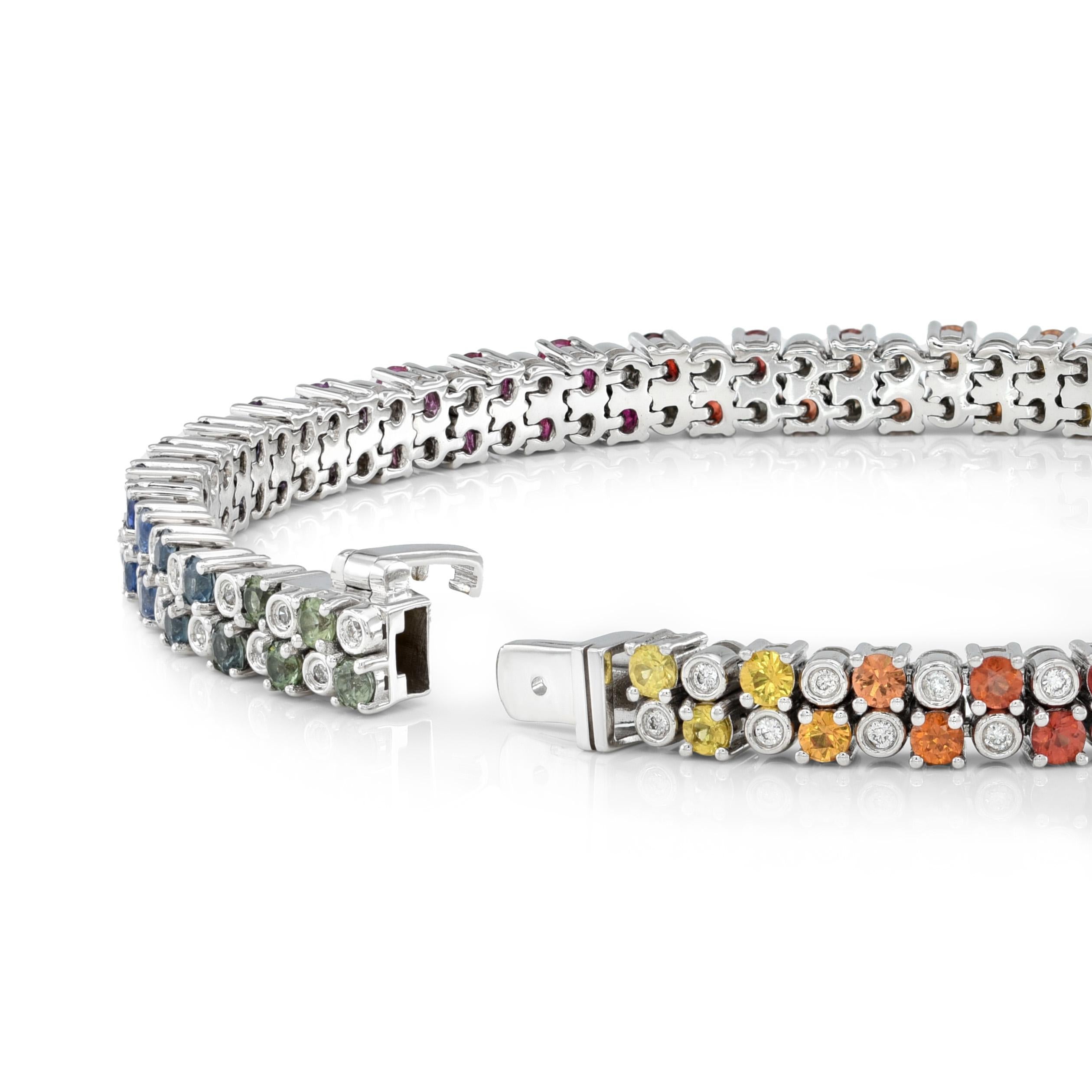 Indulge in the captivating allure of our Natural Rainbow Multi Color Sapphires and Diamonds bracelet. Featuring 3.04 carats of mesmerizing gemstones and 0.43 carats of dazzling diamonds, meticulously set in an 18K white gold bracelet. The exquisite