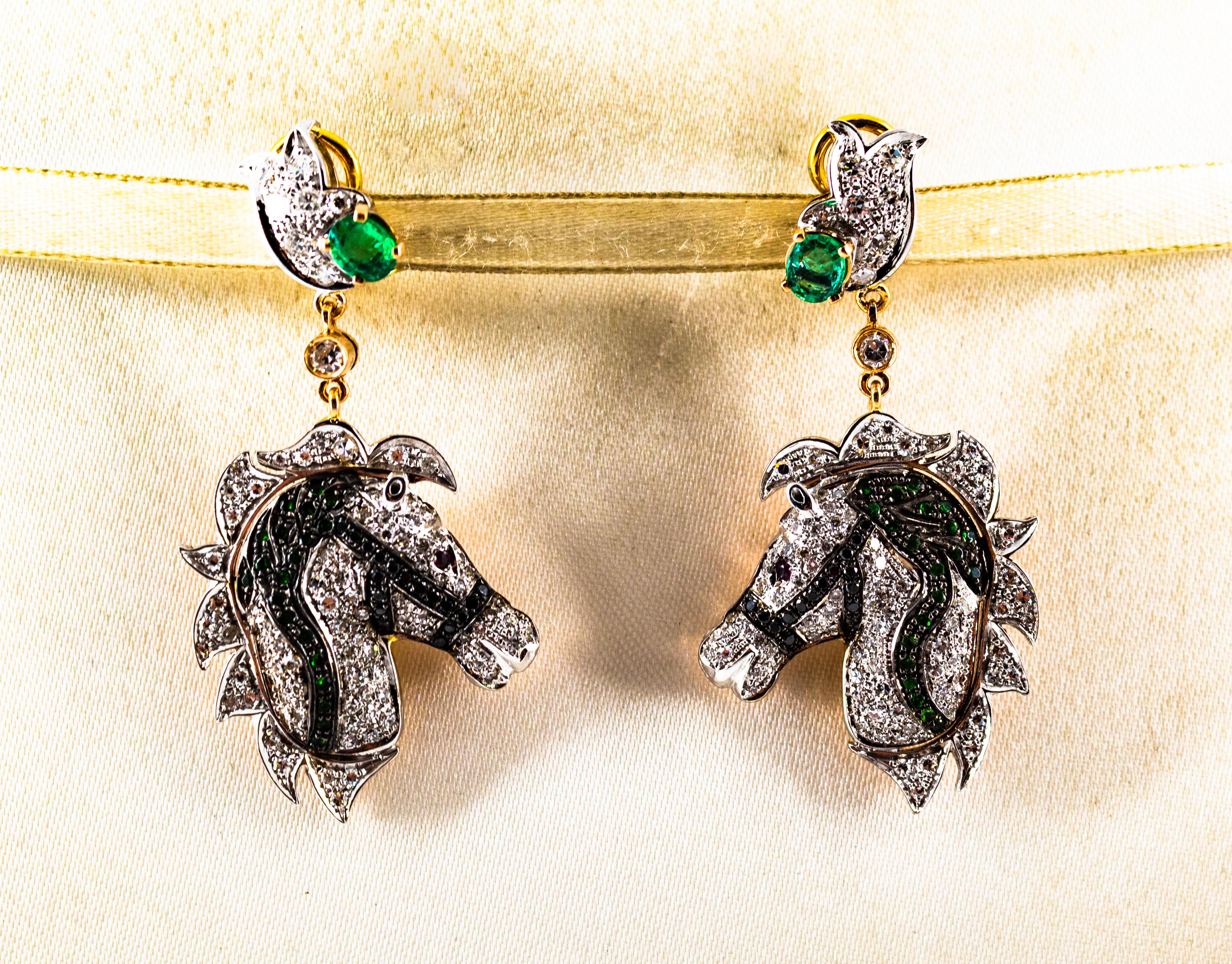 These Earrings are made of 14K Yellow Gold.
These Earrings have 1.80 Carats of White Diamonds.
These Earrings have 0.20 Carats of Black Diamonds.
These Earrings have 0.60 Carats of Emeralds.
These Earrings have 0.04 Carats of Rubies.
These Earrings