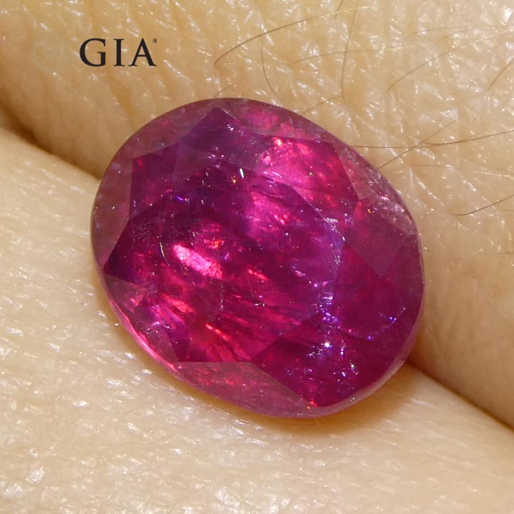 Rubino ovale rosso violaceo 3,04ct GIA certificato Afghanistan non riscaldato in vendita 7