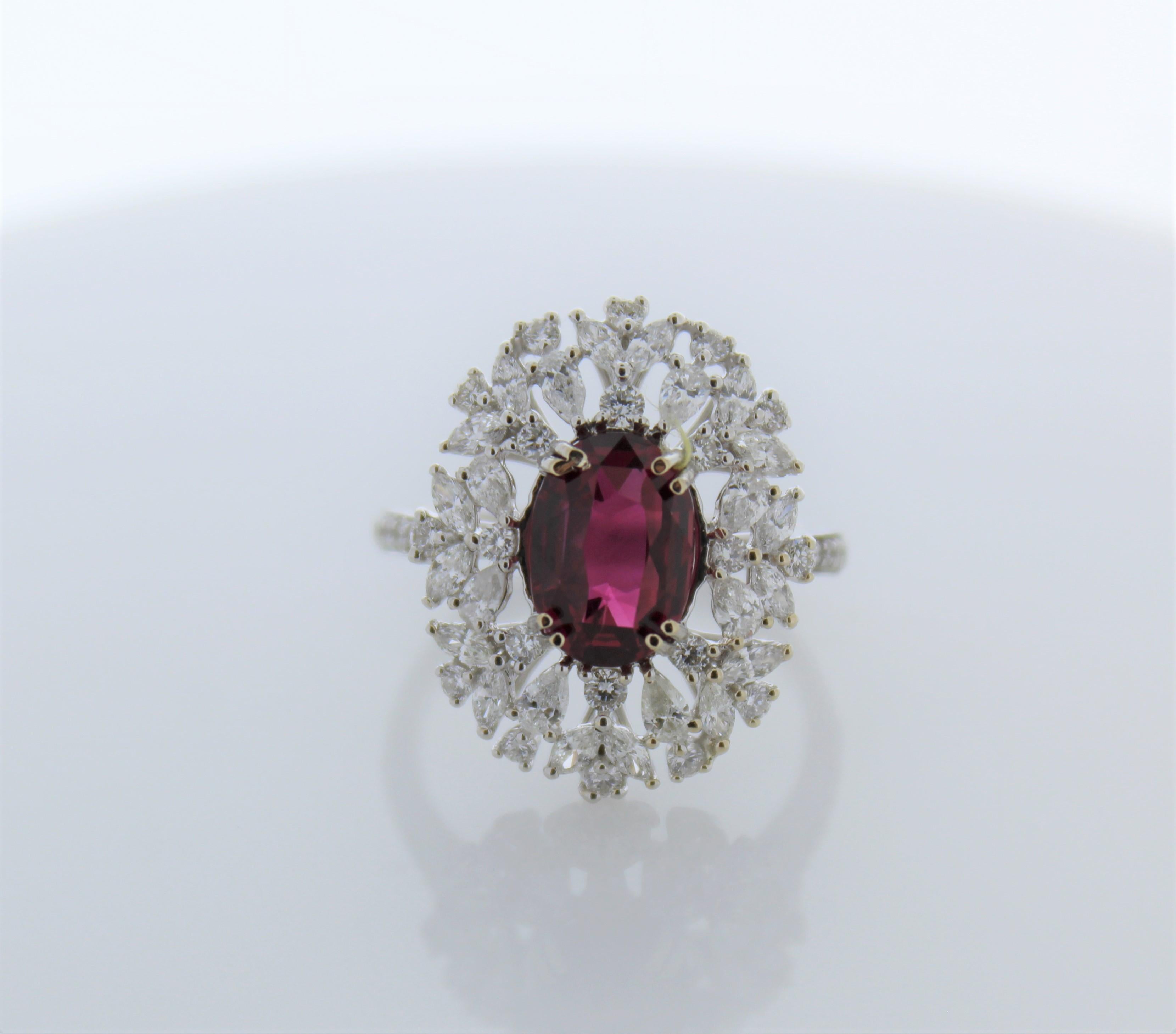 This original piece consists a ruby that weighs 3.04carats and small mixed cut 50 diamonds that total up to 1.22carats.