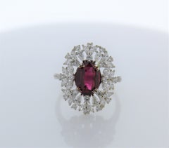 3.04ctw Ruby Oval Cut and 1.22ctw Diamond Ring in 18K White Gold