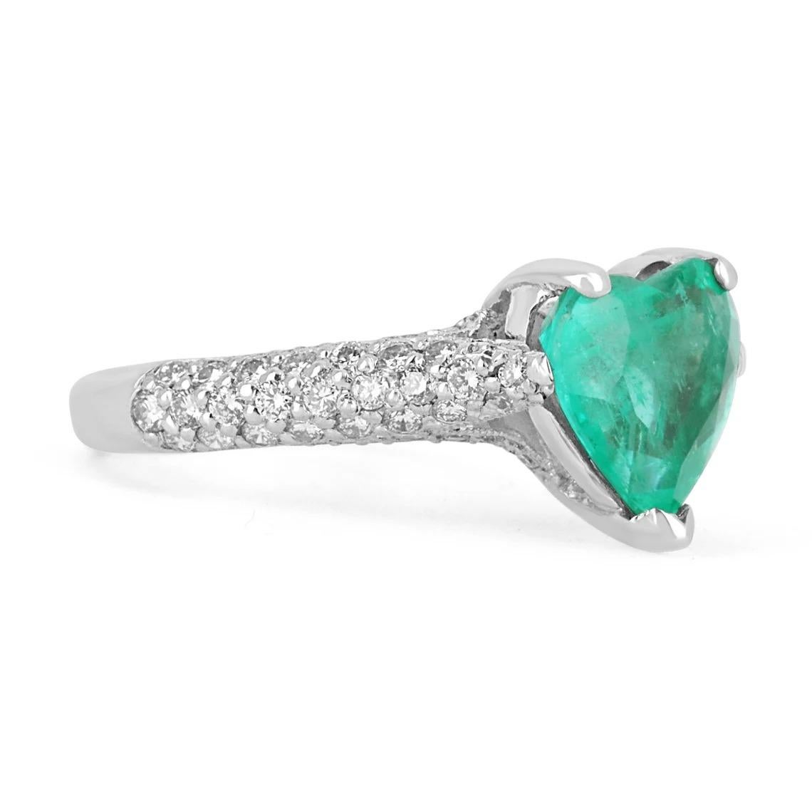 A fine, vivacious, 3.04tcw natural Colombian emerald heart & diamond ring set in platinum. The center gem is a rare cut gemstone that possesses numerous enticing qualities, of which are the following; a striking rich yellowish-green color that is