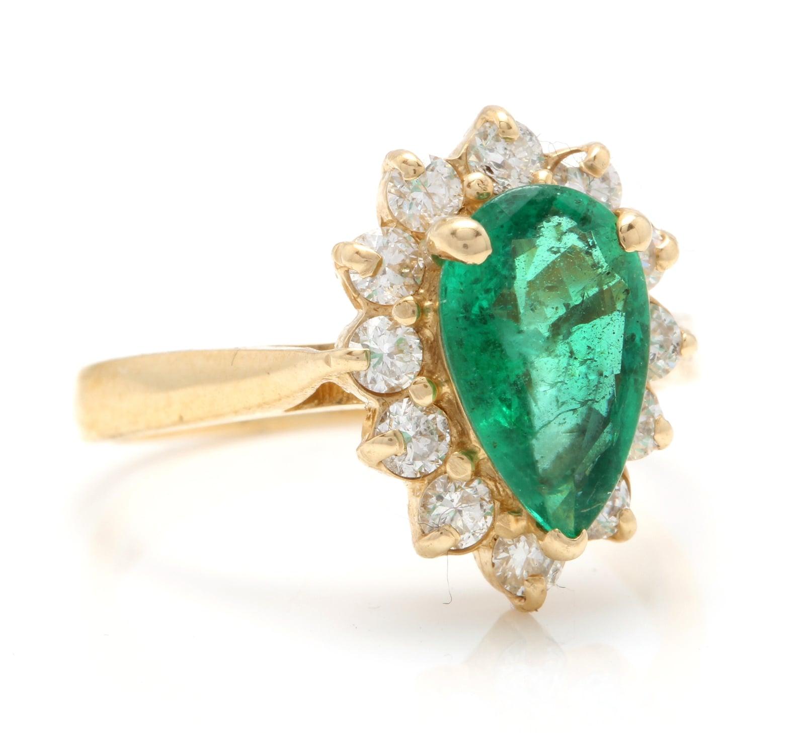 3.05 Carats Natural Emerald and Diamond 14K Solid Yellow Gold Ring

Total Natural Green Emerald Weight is: 2.40 Carats (transparent)

Emerald Measures: Approx. 10.00 x 7.00mm

Natural Round Diamonds Weight: .65 Carats (color G-H / Clarity