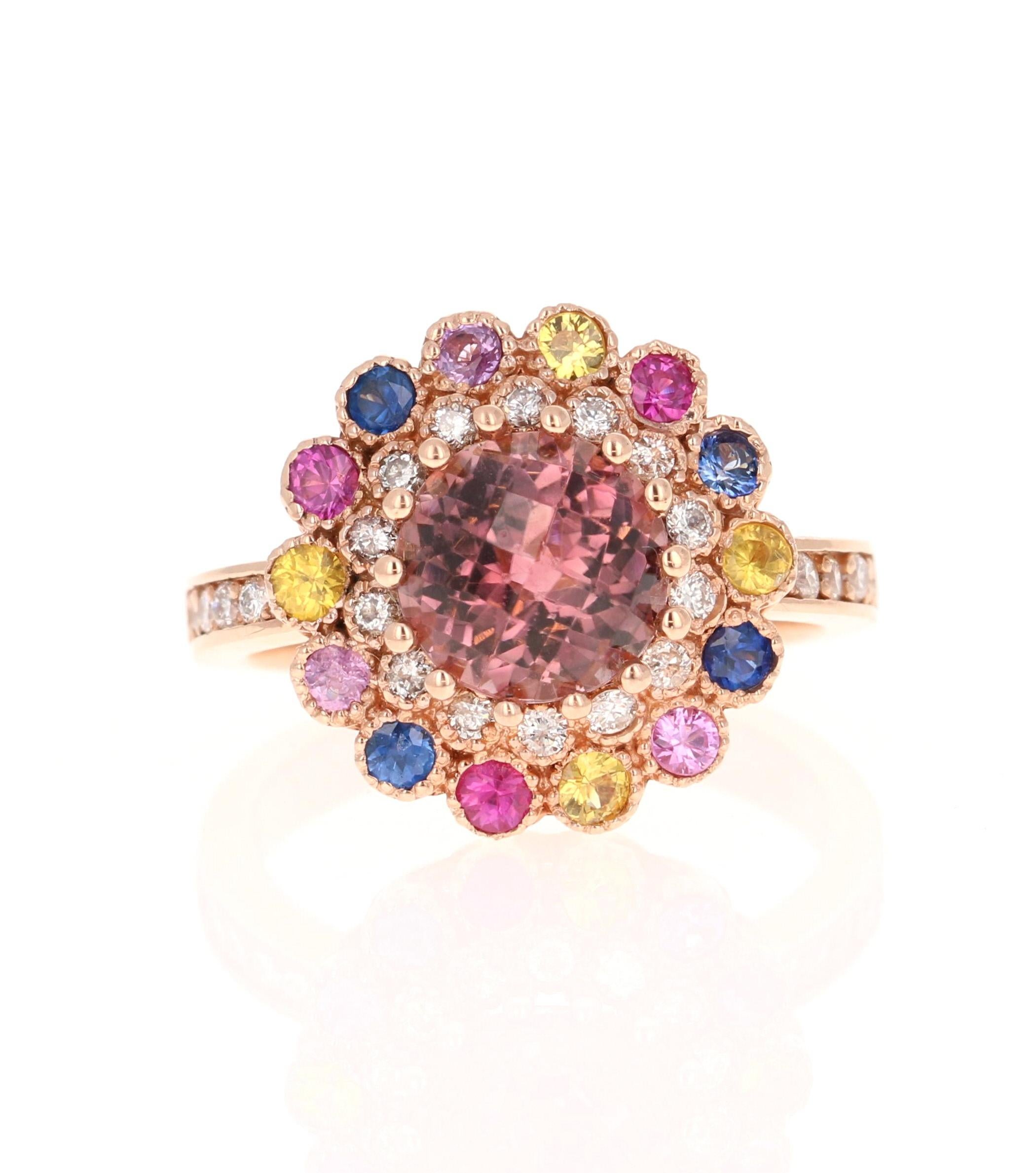 3.05 Carat Natural Tourmaline Sapphire Diamond Rose Gold Cocktail Ring

This Ring has a Round Checkered Cut Tourmaline that weighs 1.90 carats and 14 Multi Sapphires that weigh 0.79 Carats. There are also 26 Round Cut Diamonds that weigh 0.36