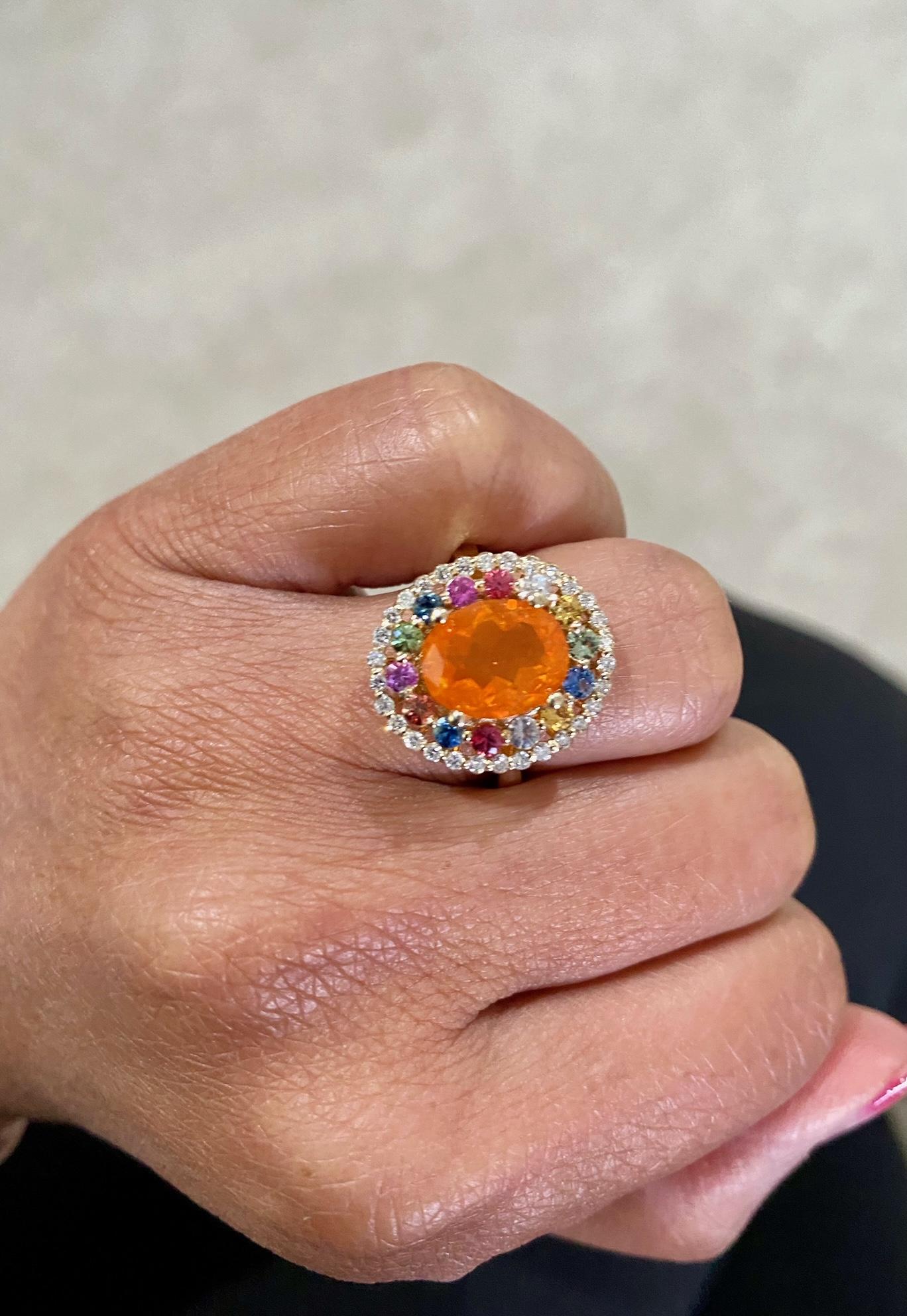 Contemporary 3.05 Carat Oval Cut Fire Opal Sapphire Diamond Yellow Gold Cocktail Ring