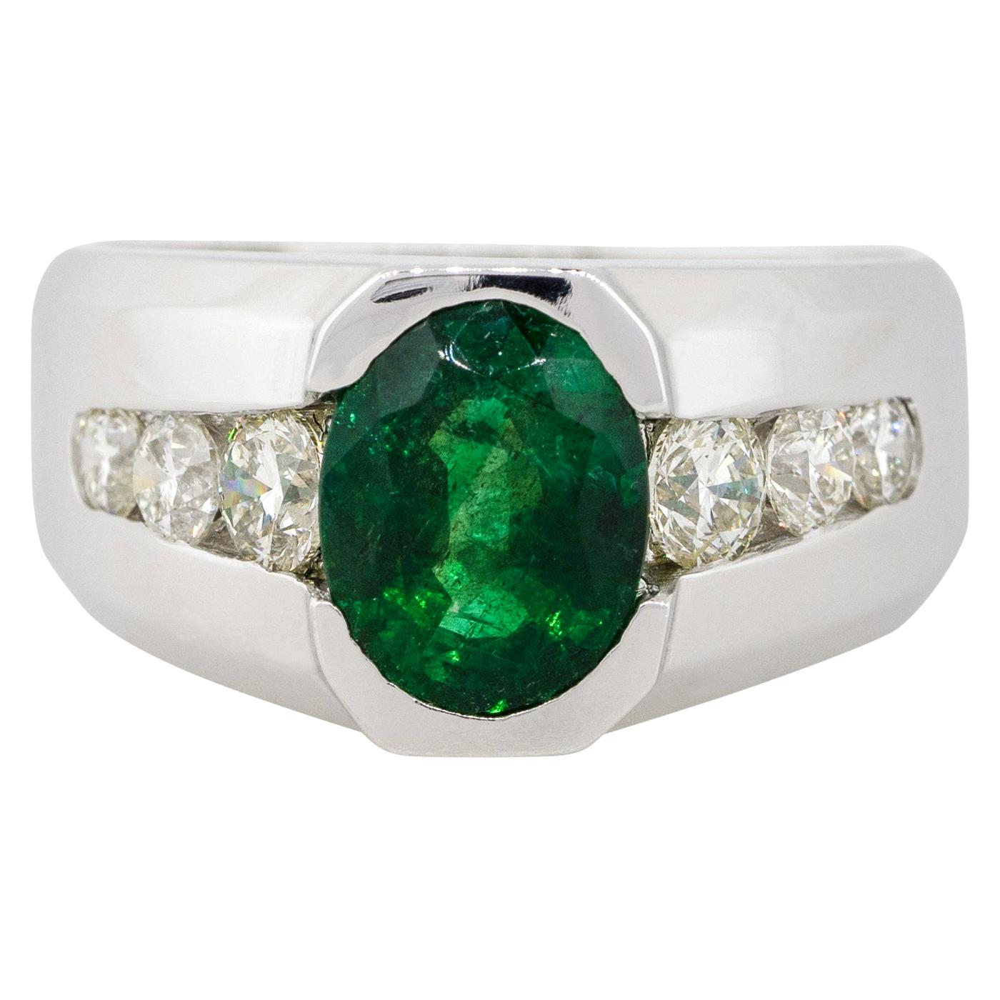 3.05 Carat Oval Emerald Center Wide Men's Ring with Diamonds 14 Karat in Stock For Sale