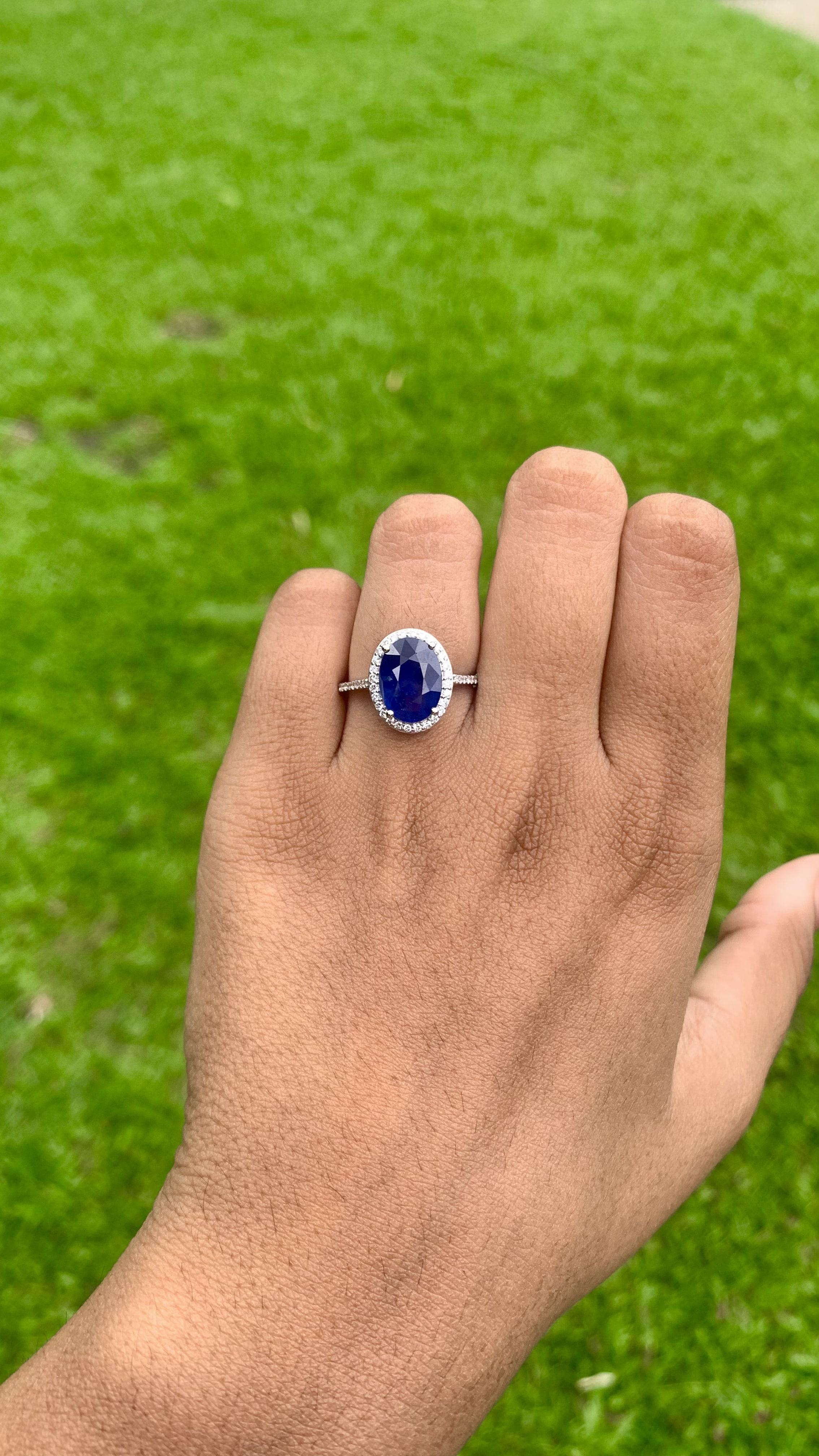 Radiating a classic aura, this remarkable piece has been specially designed to accentuate the mesmerizing beauty of this royal blue sapphire.

The sapphire, a regal emblem of rich sophistication, boasts a captivating royal blue hue and a total
