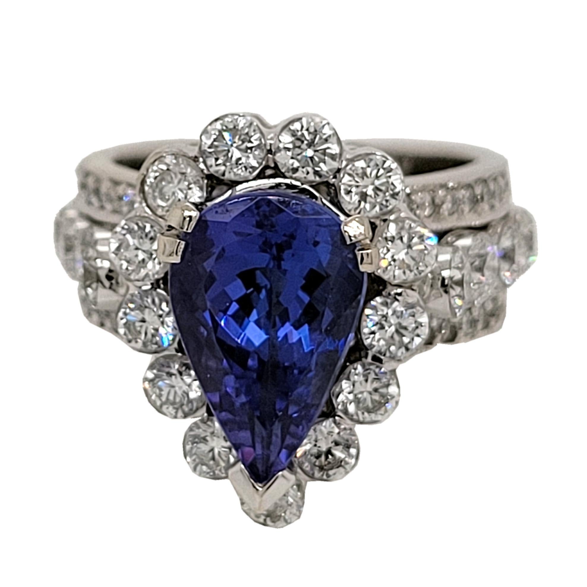 Pear Cut 3.05 Carat Pear Shape Tanzanite 18 Karat Engagement Ring with Halo For Sale