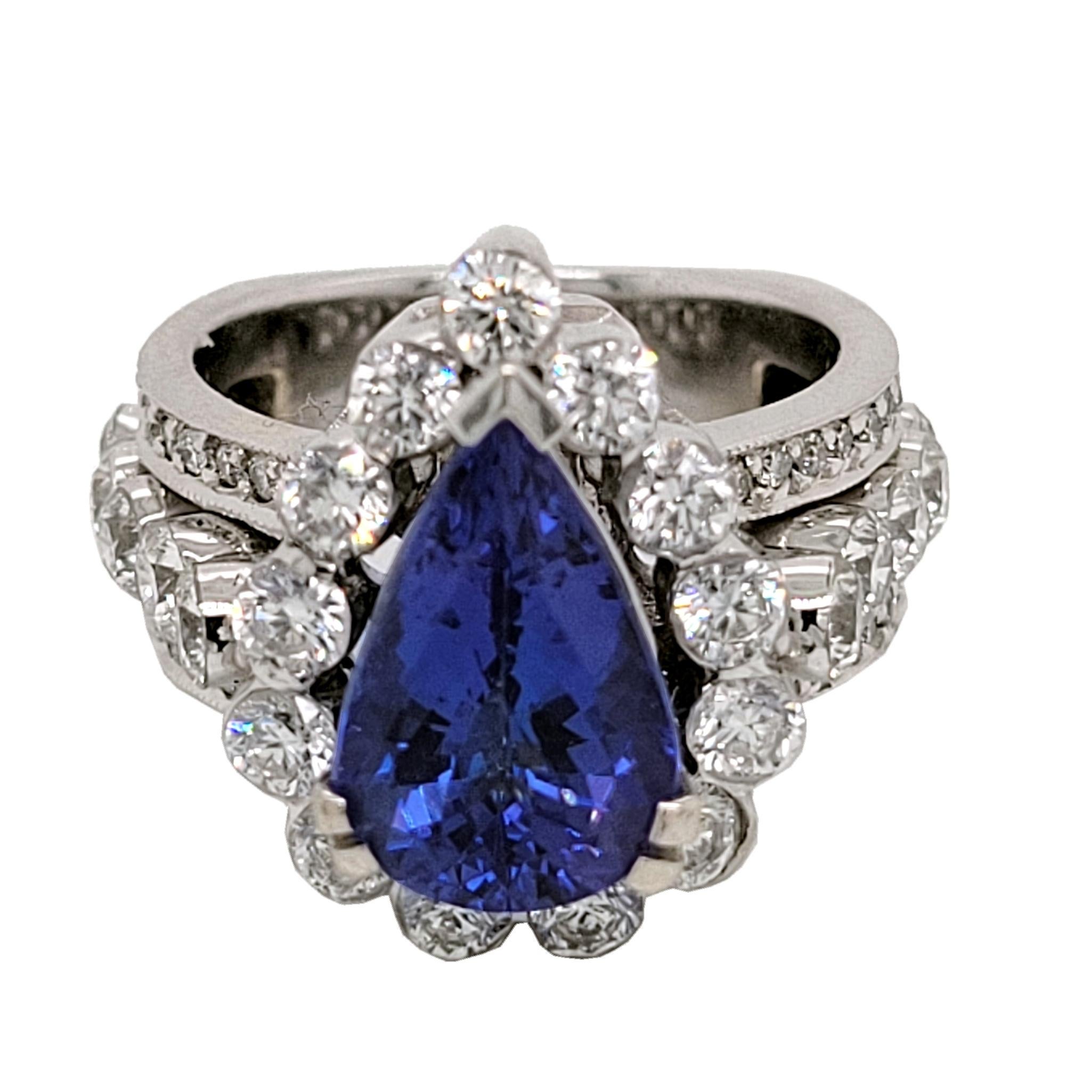 3.05 Carat Pear Shape Tanzanite 18 Karat Engagement Ring with Halo In New Condition For Sale In Los Angeles, CA