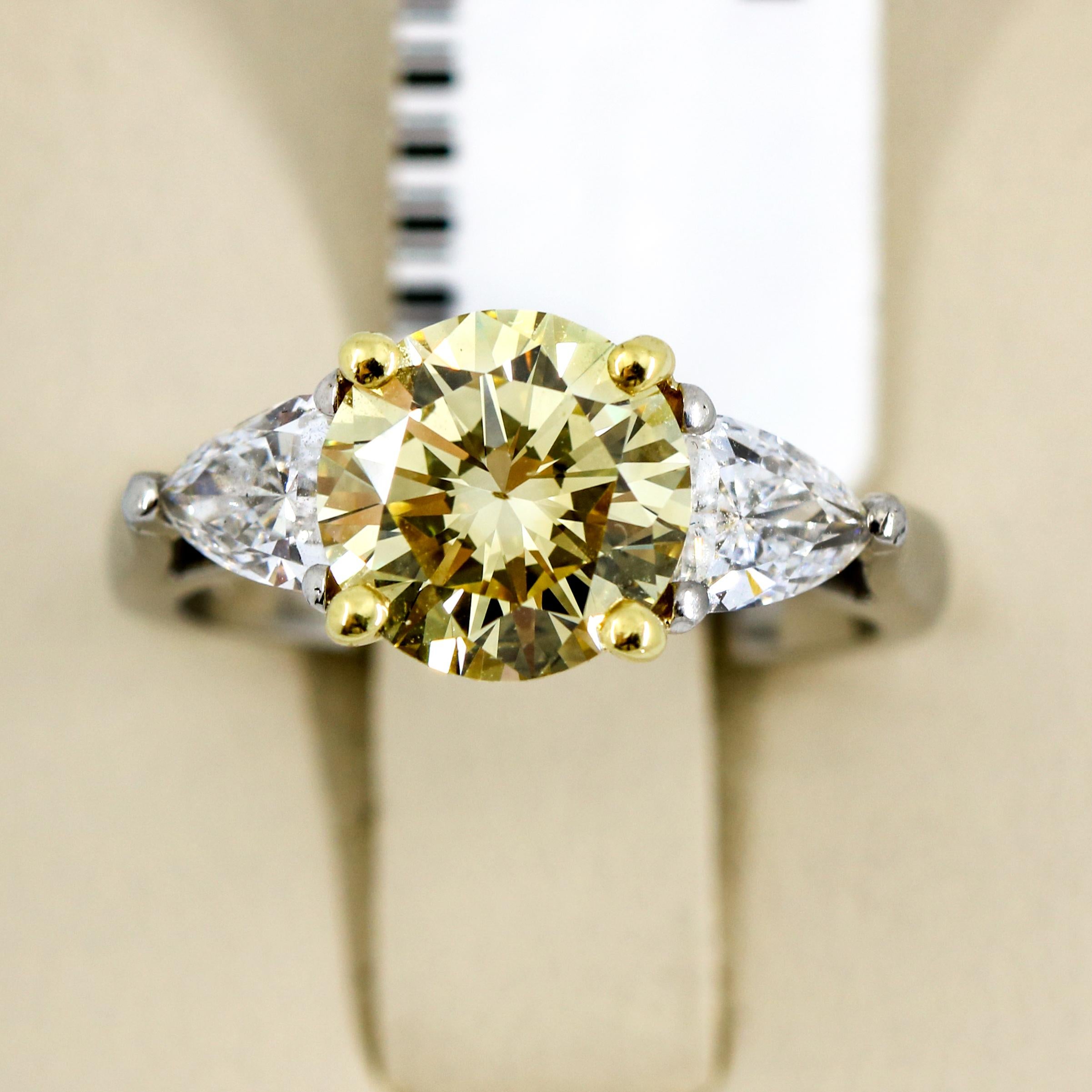 3.05 Carat Platinum GIA Certificate Fancy Yellow Diamond Engagement Ring For Sale 3