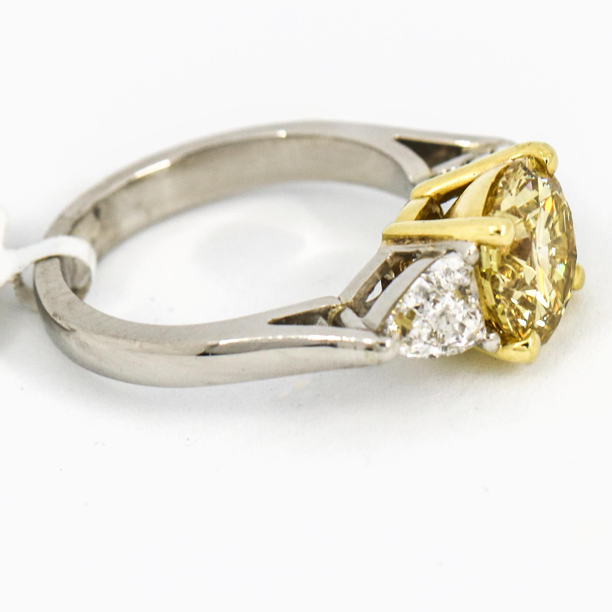 3.05 Carat Platinum GIA Certificate Fancy Yellow Diamond Engagement Ring For Sale 1