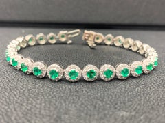3.05 Carat Round Cut Emerald and Diamond Tennis Bracelet in 14K White Gold