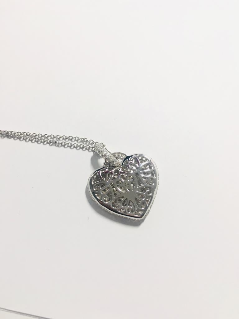 This dazzling pave set pendant is our interpretation of the iconic symbol of love, it's the perfect gift for that special person in your life.

Featuring 3.05ct of slightly concave pave set round brilliant cuts to the front and a beautiful filigree