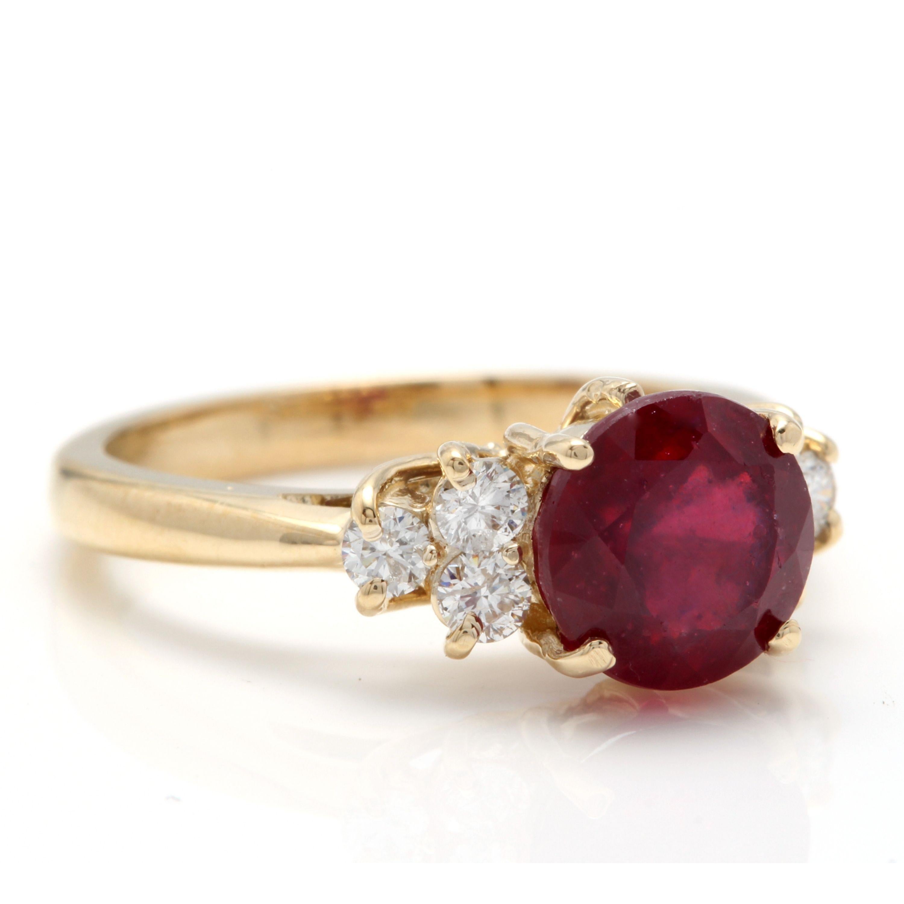 3.05 Carats Impressive Red Ruby and Diamond 14K Yellow Gold Ring

Total Red Ruby Weight is: Approx. 2.70 Carats

Ruby Measures: Approx. 7mm

Ruby Treatment: Fracture filling

Natural Round Diamonds Weight: Approx. 0.35 Carats (color G-H / Clarity