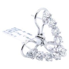 Boucles d
oreilles poire en or blanc 18k avec cinq diamants naturels de 3,05 carats
