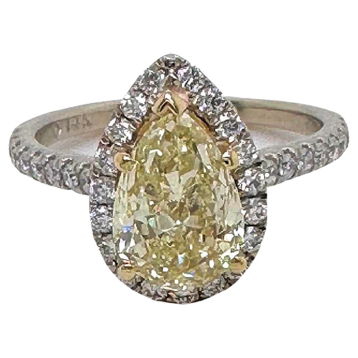 3.05tcw Pear Shape Natural FLBG Yellow SI2 Halo Diamond Engagement Ring For Sale