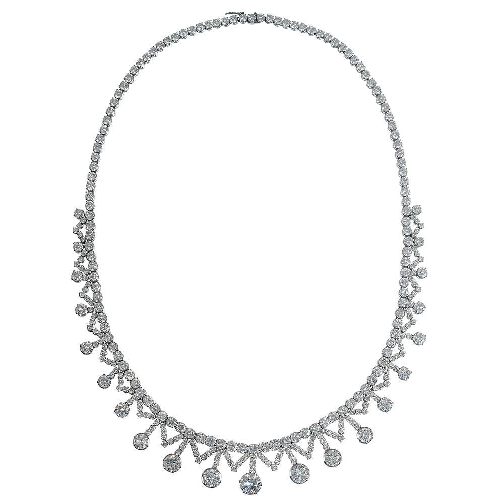 This exceptional creation exemplifies important vintage jewelry. Created of platinum, the piece was designed with the feminine charm of the Belle Epoche era, with diamonds of ascending sizes achieving a lacy fringe of brilliance. The necklace is