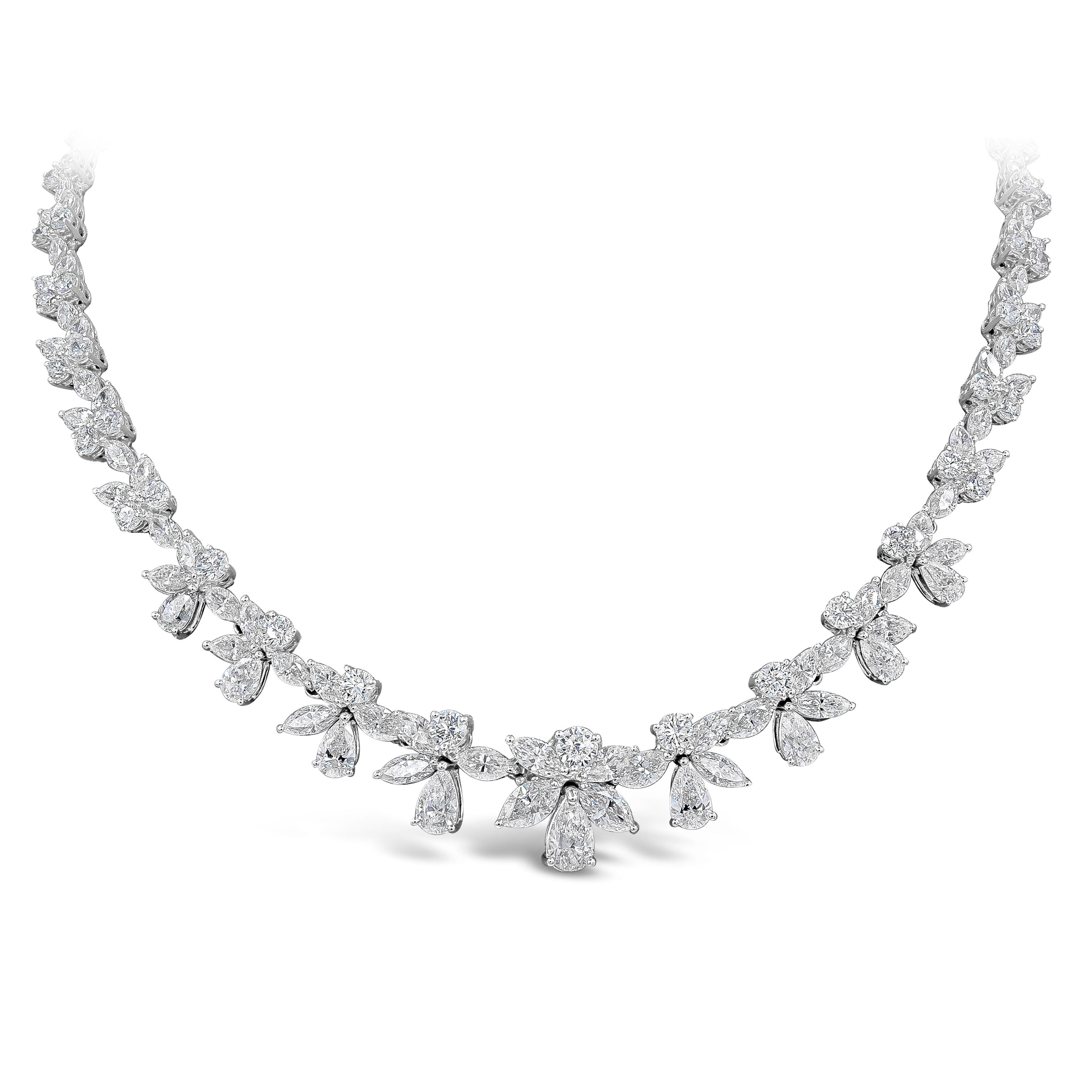 Elegant and finely crafted high end graduating diamond necklace showcasing a cluster of marquise, pear, and round brilliant diamonds. Elegantly arranged in an intricate and creative design. 119 marquise cut diamonds weighs 18.52 carat total. 65