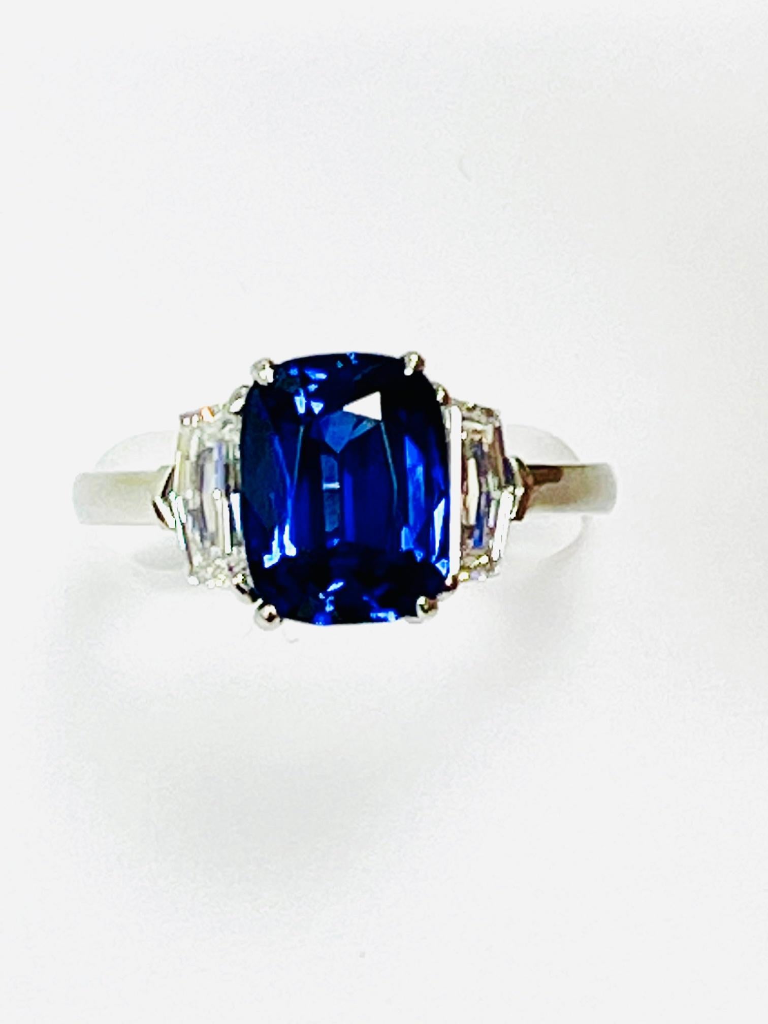 CDC  certified 3.06 Carat Cushion Sapphire in hand made platinum  Ring with 0.90 carat fancy cut 