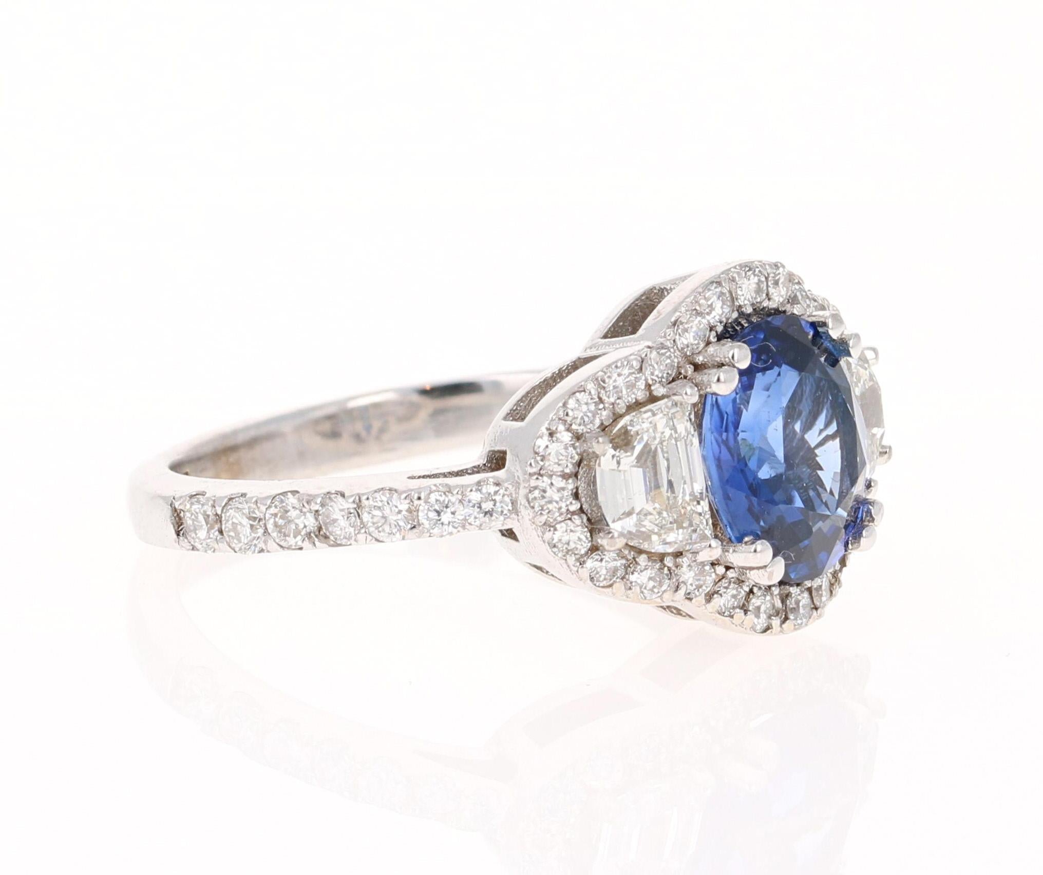 Beautiful Sapphire Diamond ring with an intricate setting! 

This ring has a Blue Sapphire that weighs 1.95 Carats and is GIA Certified. The Sapphire is a natural Blue Oval Cut with NO indications of heating. The GIA Certificate Number is: