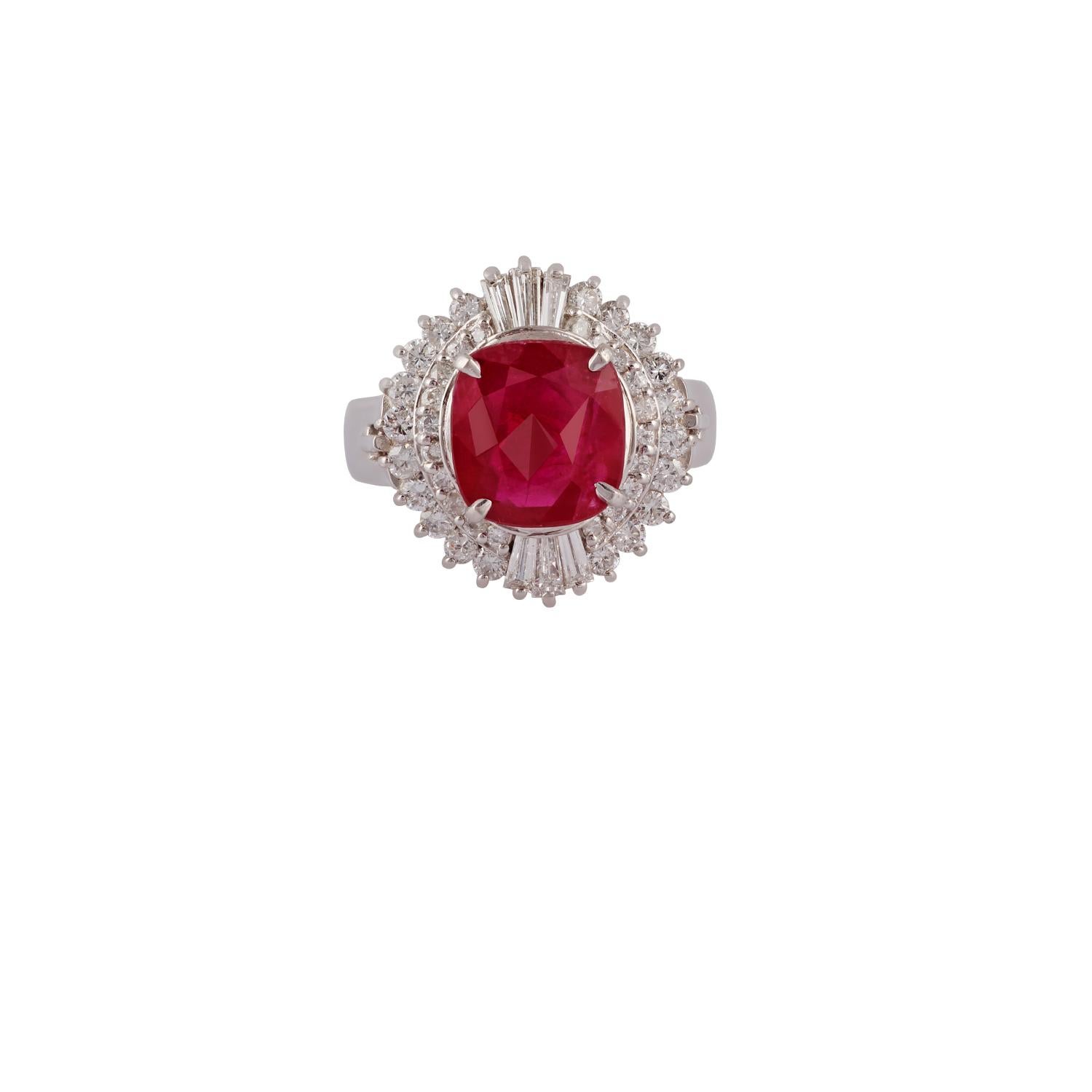 This is an elegant ruby & diamond ring studded in 18k white gold features 1 piece of cushion shaped ruby weight 3.06 carat with round & baguette shaped of diamonds weight 1.01 carat, this entire ring is made of 18k white gold weight 10.13 grams,