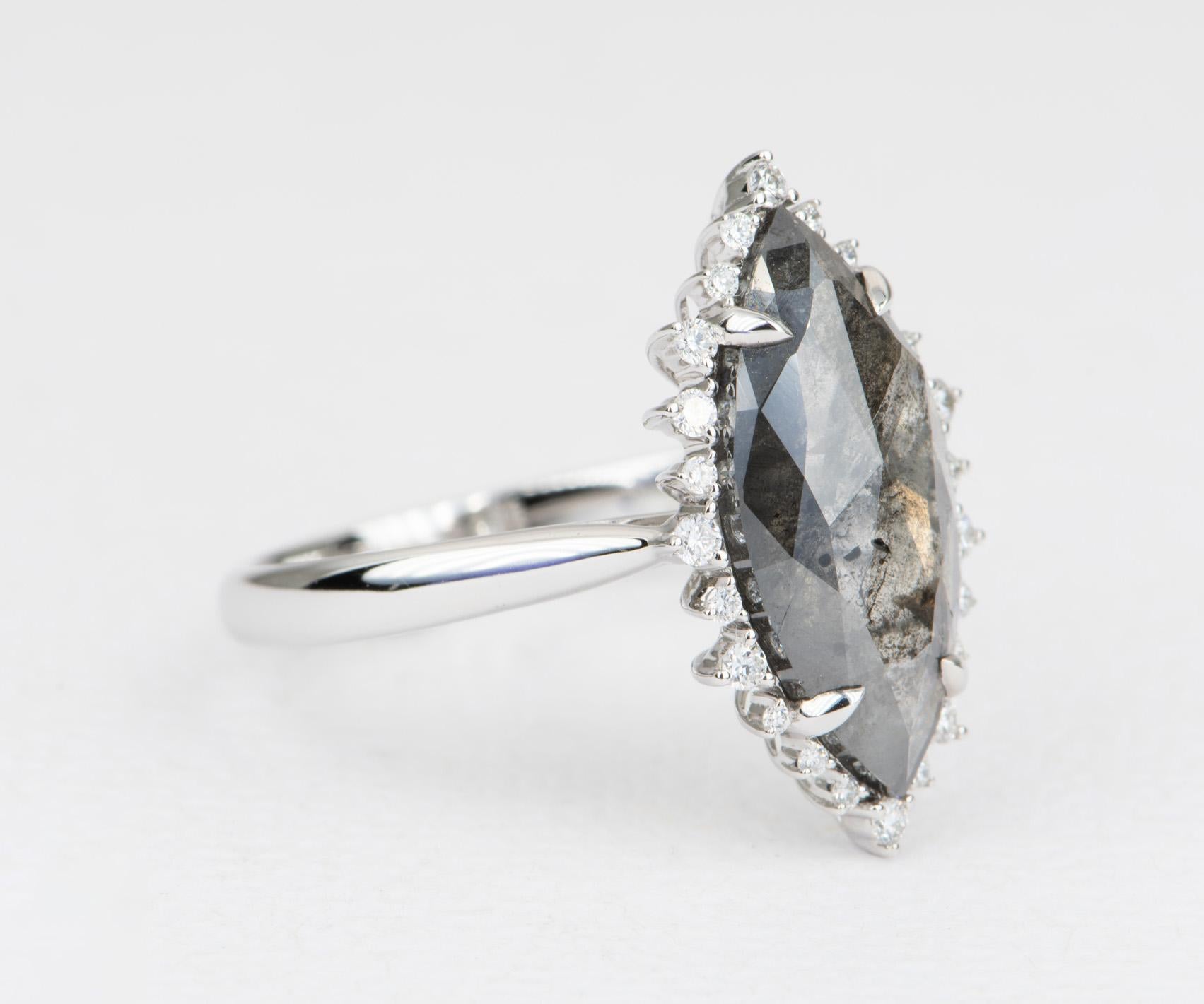 ♥  This beautiful salt and pepper marquise diamond sits in the center and in set with four prongs. 
♥  The center is flanked by white sparkly diamonds, then set in a long shield/kite shape.
♥  The setting is slightly raised, so it will stack flush