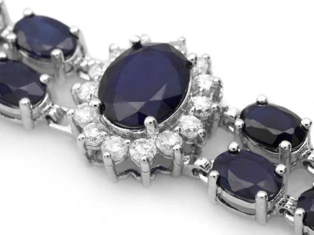 30.60 Natural Blue Sapphire and Diamond 14K Solid White Gold Bracelet

Total Natural Sapphire Weight is: Approx. 28.90 carats 

Sapphires Measure: Approx. 6x4 - 9x7 mm

Sapphire Treatment: Diffusion

Total Natural Round Diamonds Weight: Approx. 1.70