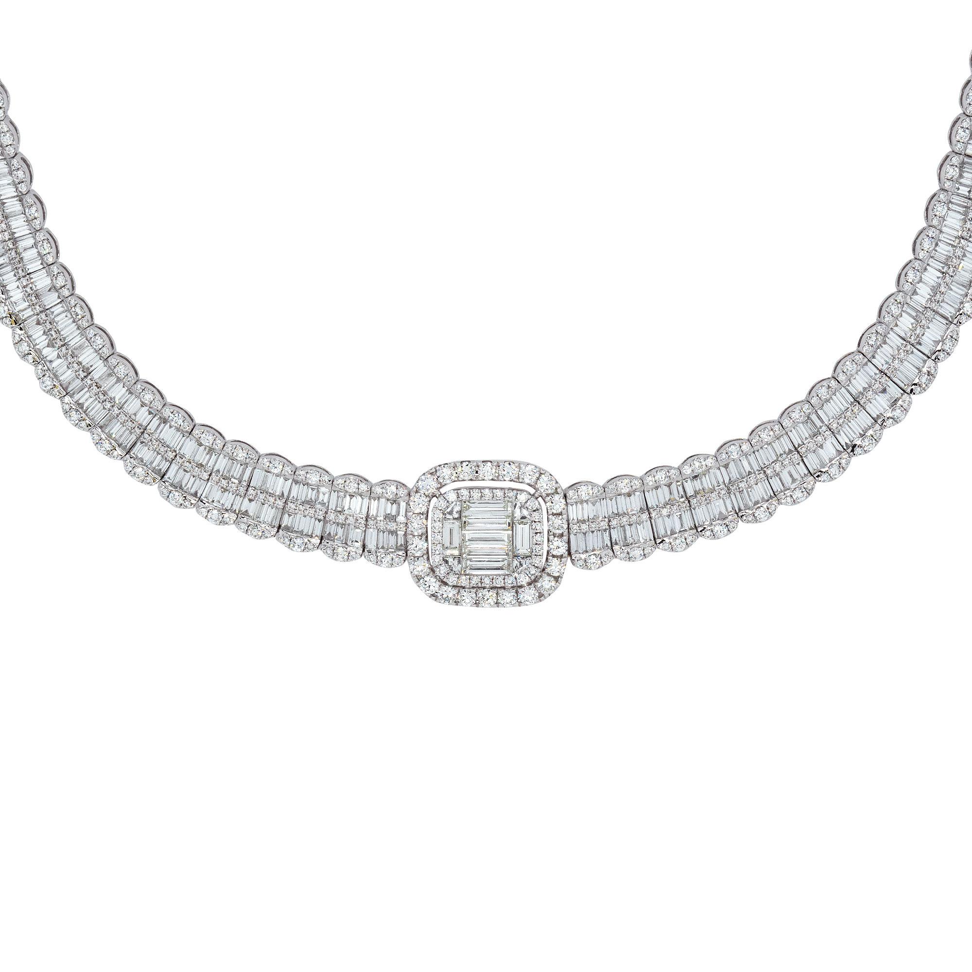 Elevate your style with the captivating allure of this 18k White Gold 30.68ctw Round & Baguette Diamond Illusion set Necklace. Meticulously crafted in 18k white gold, this exquisite piece features a mesmerizing diamond pave, showcasing approximately