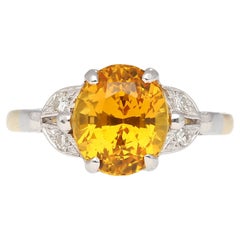 3.06 Ct Oval Yellow Sapphire with Diamonds Sides Ring in Platinum and 14k Gold
