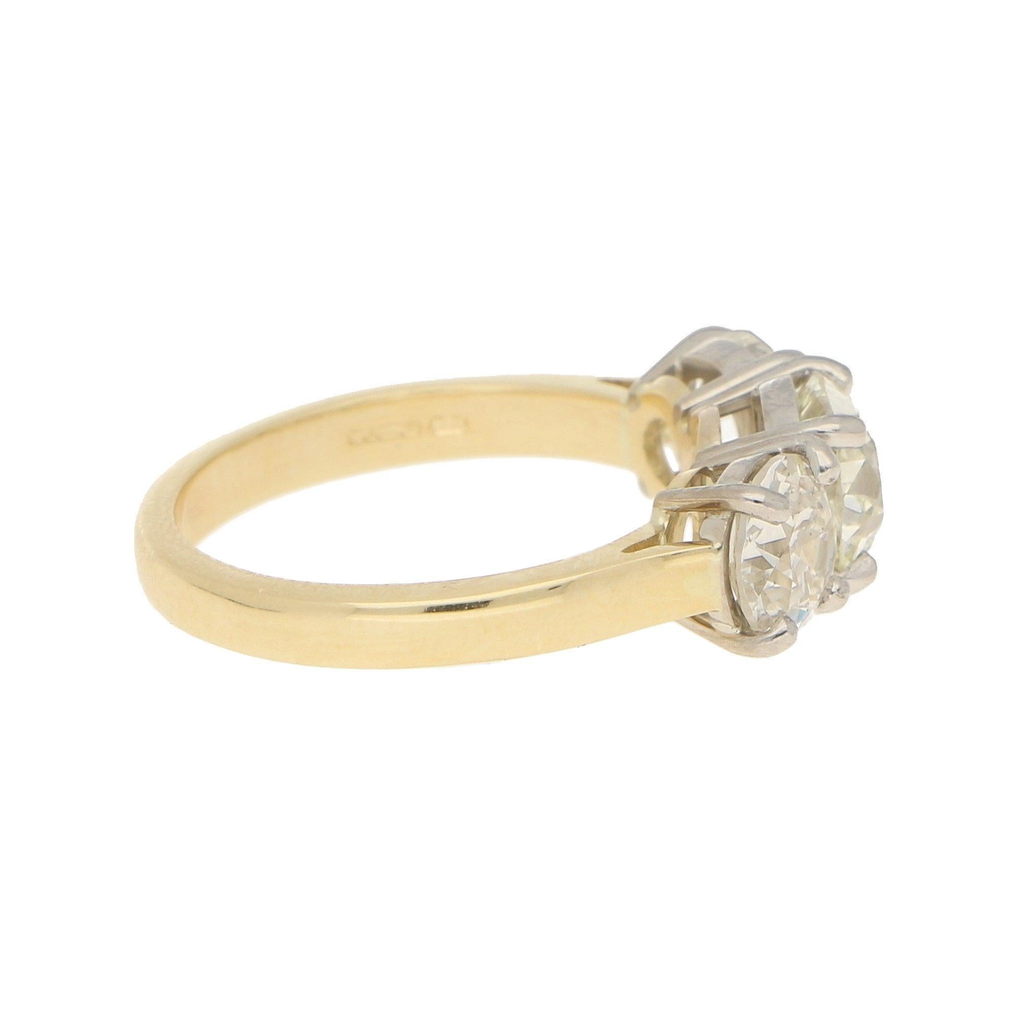 Modern Three-Stone Old Cut Diamond Engagement Ring in 18k Yellow and White Gold   For Sale