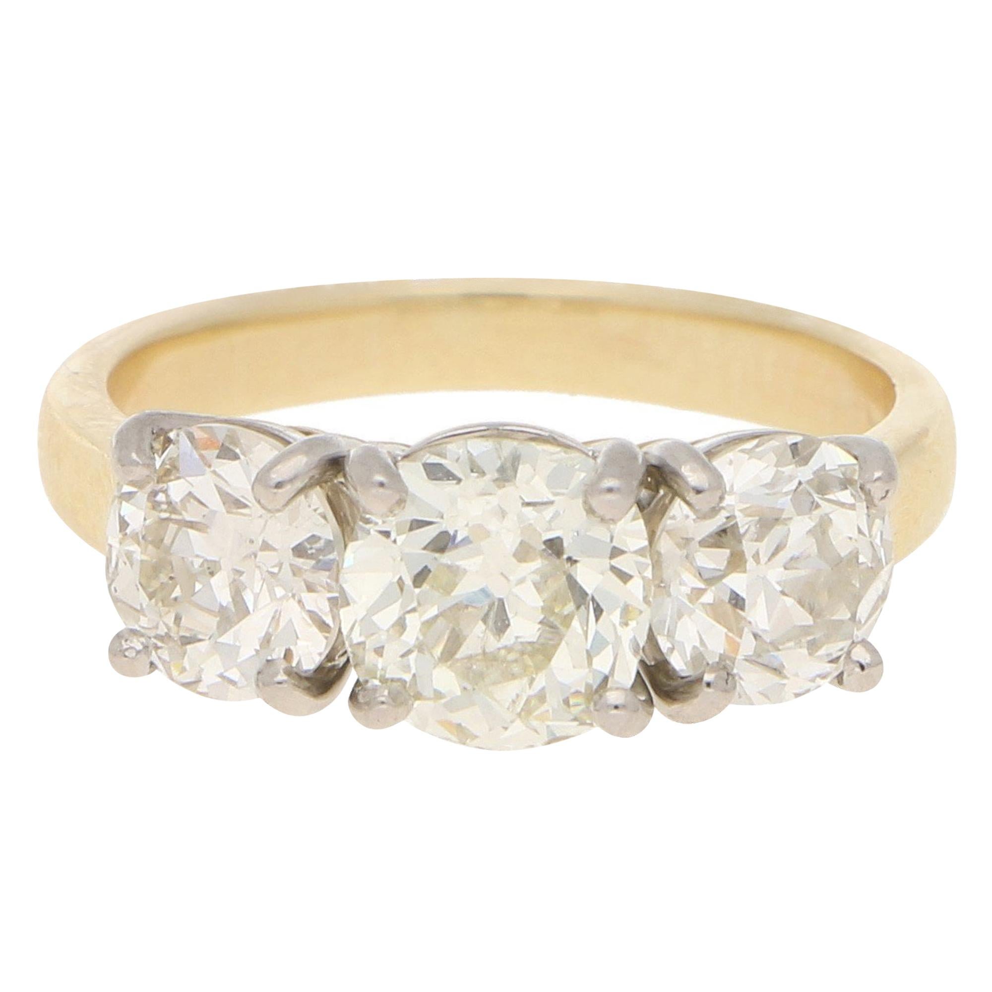 Three-Stone Old Cut Diamond Engagement Ring in 18k Yellow and White Gold  