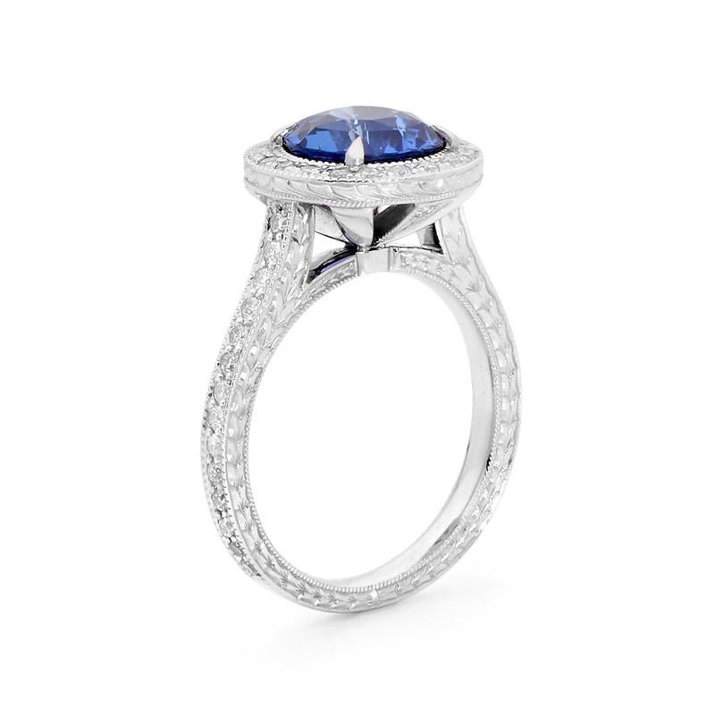 Art Deco 3.07 Carat Ceylon Sapphire Hand Engraved Platinum Diamond Halo Engagement Ring For Sale