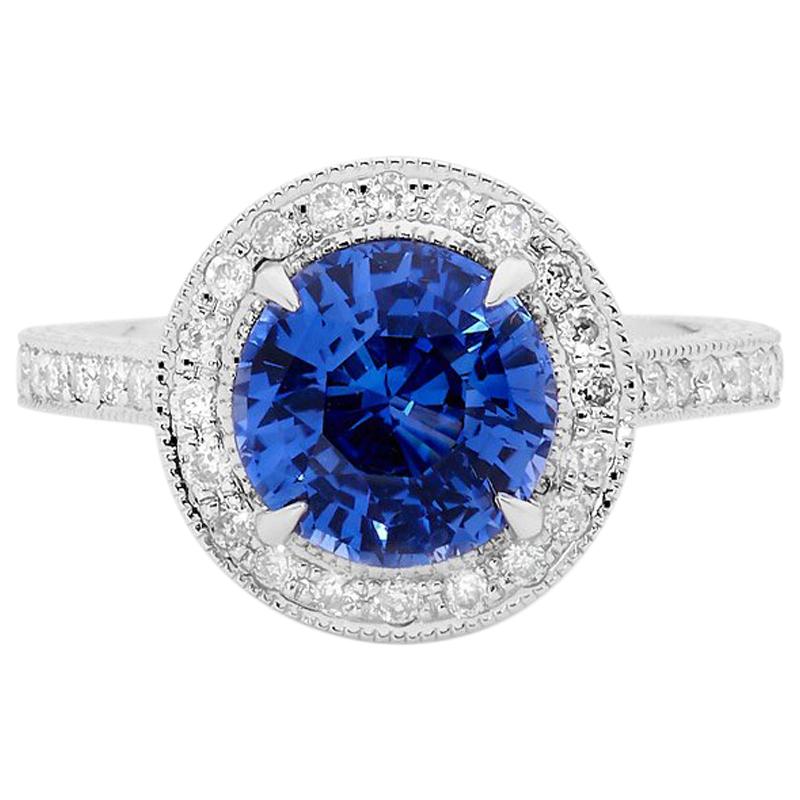 3.07 Carat Ceylon Sapphire Hand Engraved Platinum Diamond Halo Engagement Ring For Sale