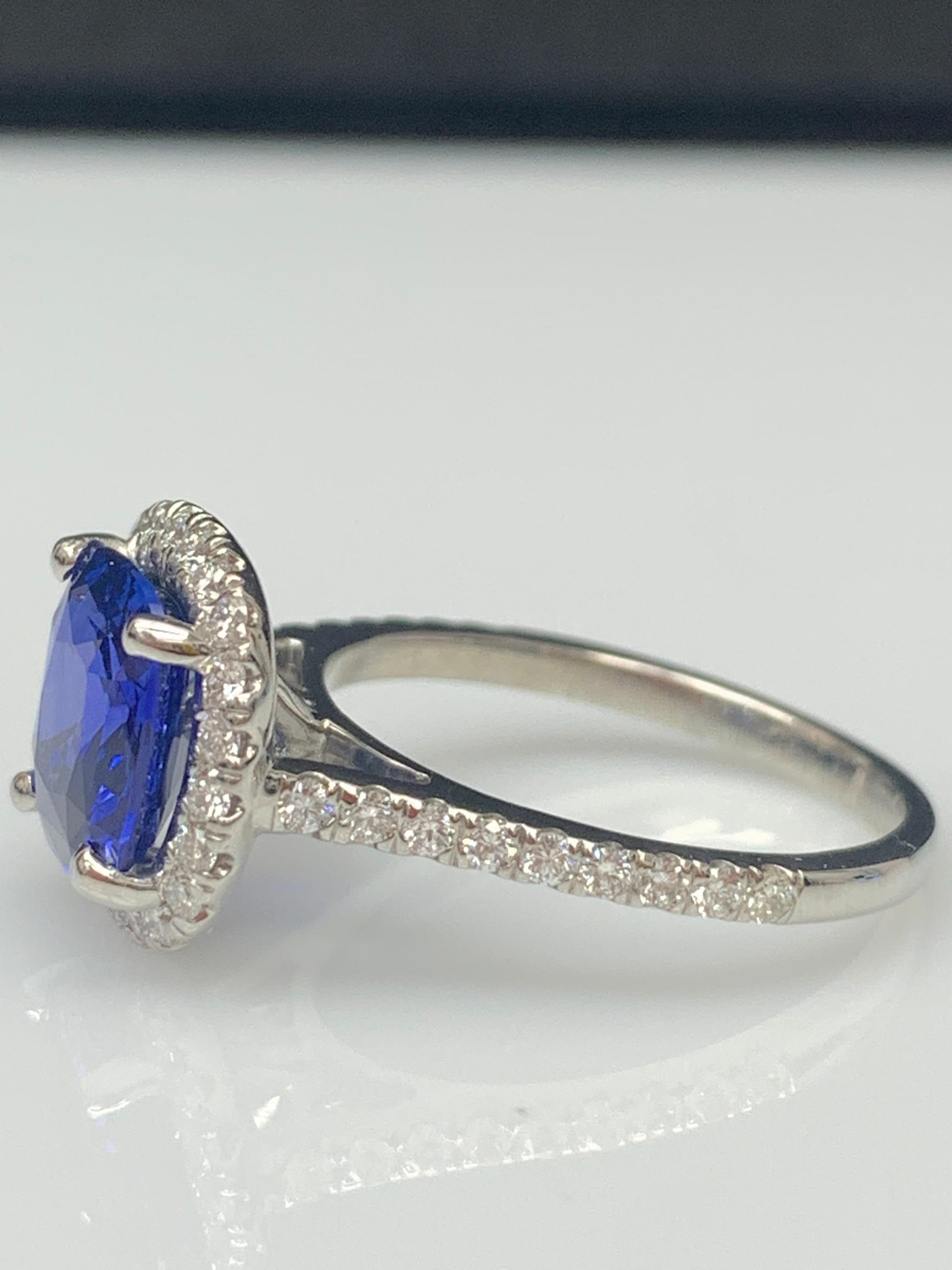 3.07 Carat Cushion Cut Sapphire and Diamond Halo Ring in Platinum For Sale 10