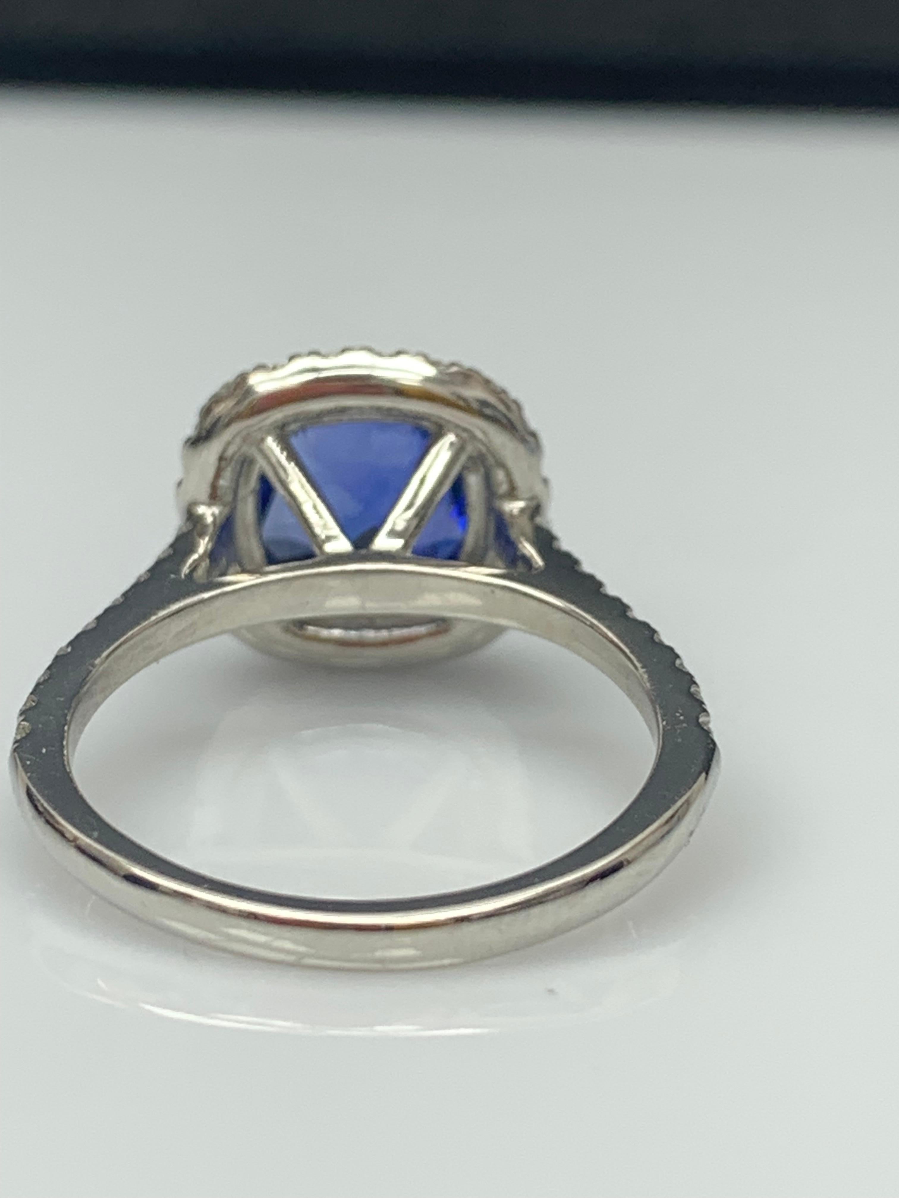 3.07 Carat Cushion Cut Sapphire and Diamond Halo Ring in Platinum For Sale 11