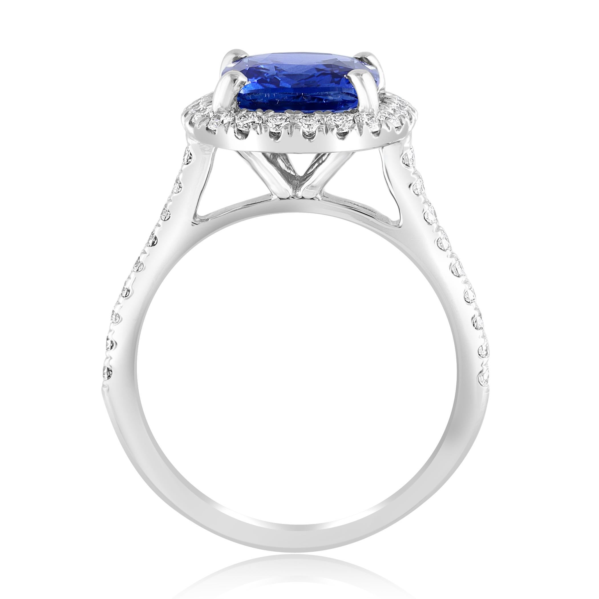 Modern 3.07 Carat Cushion Cut Sapphire and Diamond Halo Ring in Platinum For Sale
