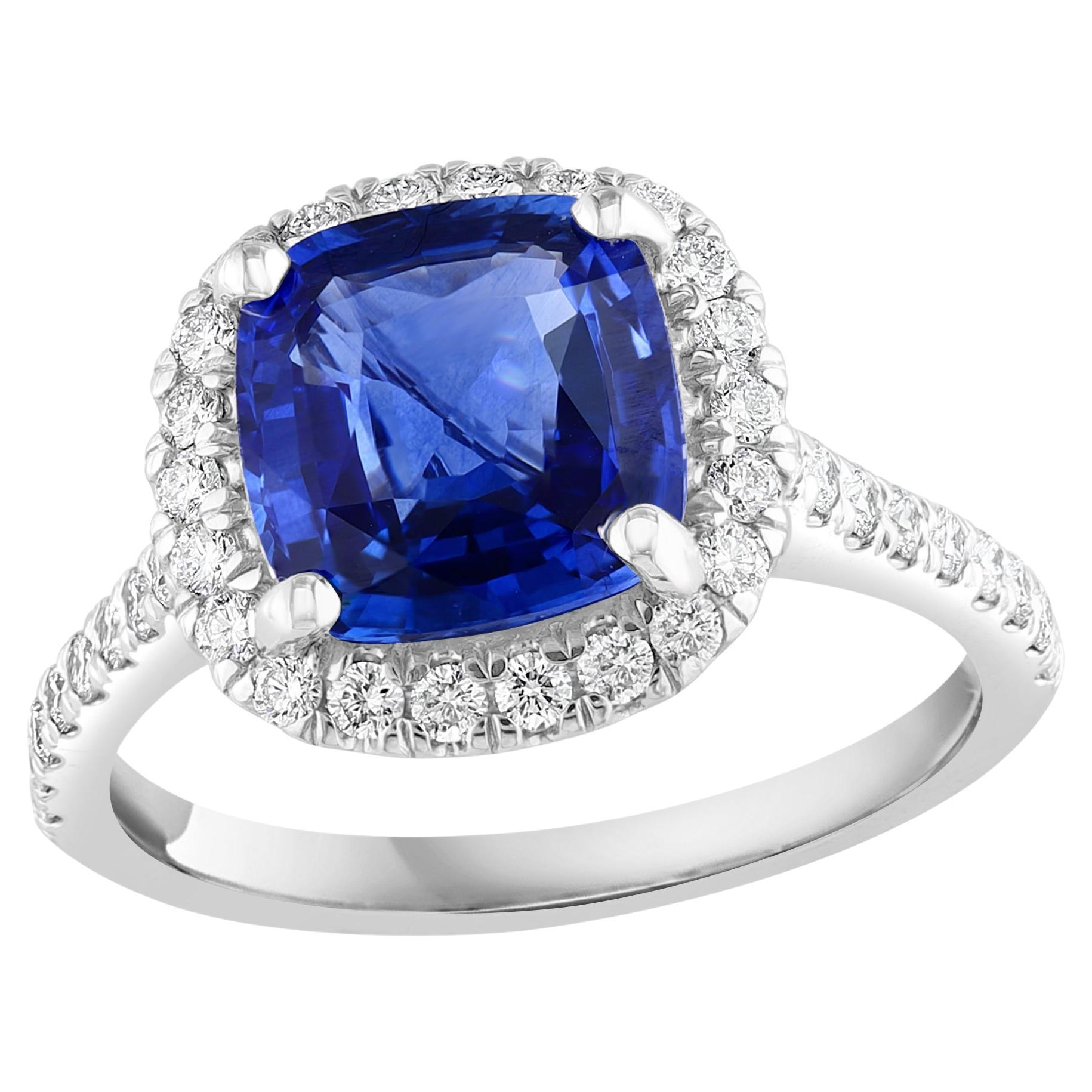3.07 Carat Cushion Cut Sapphire and Diamond Halo Ring in Platinum For Sale
