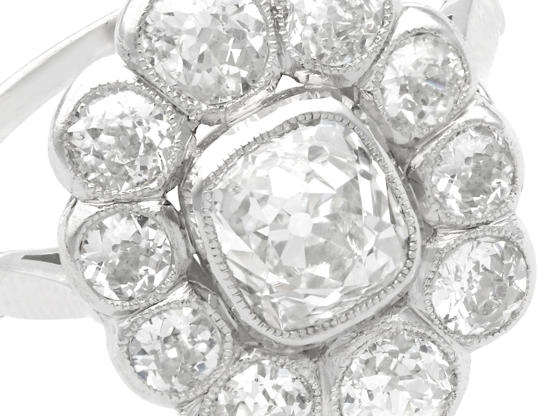 Round Cut 3.07 Carat Diamond and Platinum Cluster Ring For Sale