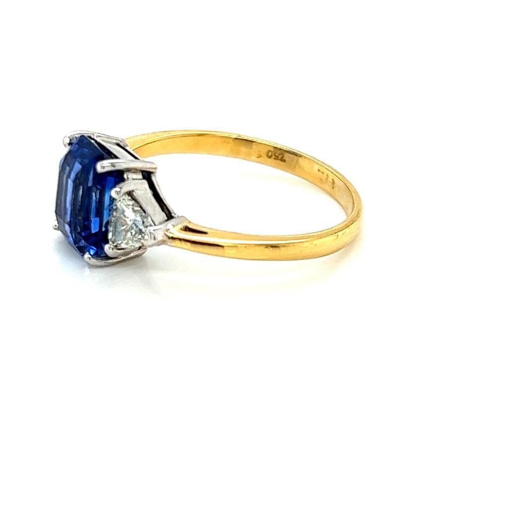 Emerald Cut 3.07 Carat Emerald cut Blue Sapphire and Diamond Ring in 18 Karat Yellow Gold For Sale